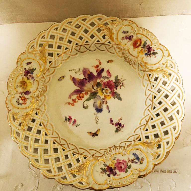 Hand-Painted Set of Ten Meissen Reticulated Dessert Plates Painted with Flowers and Insects