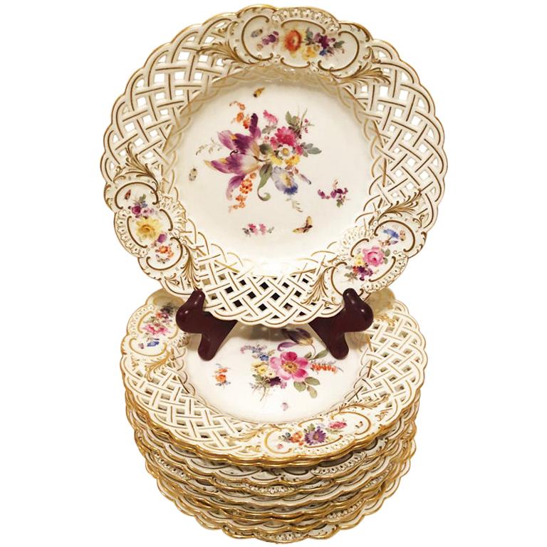 Set of Ten Meissen Reticulated Dessert Plates Painted with Flowers and Insects