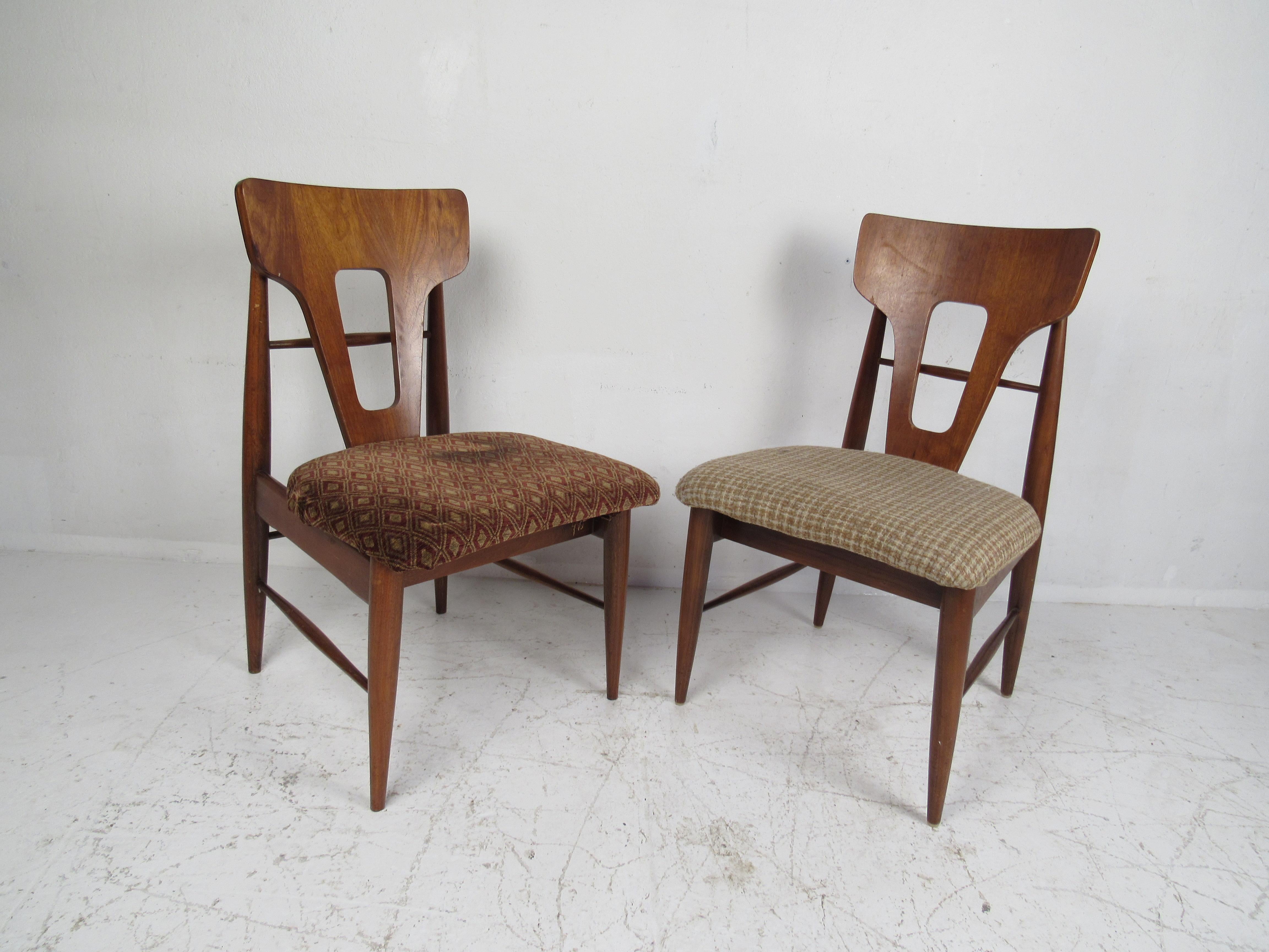 A unique set of ten vintage modern dining chairs designed in the style of, 