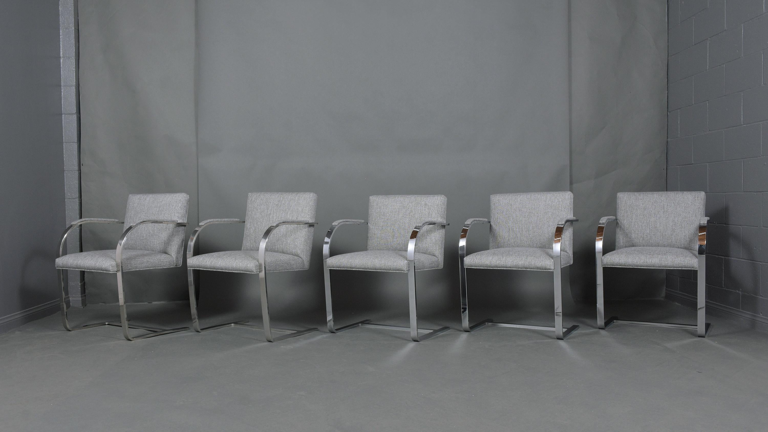 An extraordinary set of ten dining chairs after Mies Van Der Rohe are in good condition newly restored and have been newly upholstered by our team of expert craftsmen. The chairs have a sturdy flat steel frame that has been polished/buffed and is