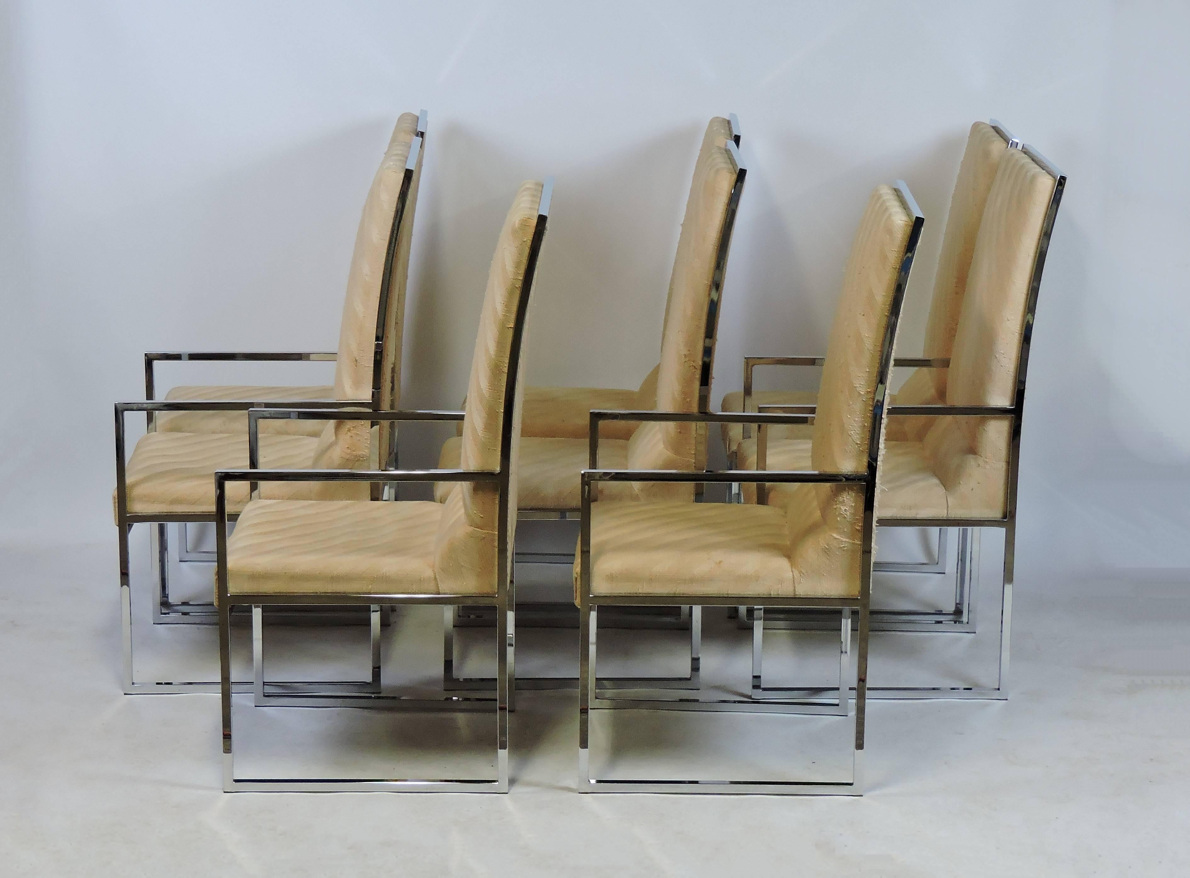 Handsome set of ten high back dining chairs manufactured by Design Institute of America. These heavy and high quality chairs have a clean, classic look with thin chrome frames and upholstered backs and seats. This unusually large set includes four