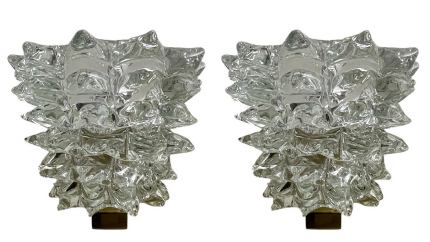 Elegant set of Ten Italian wall sconces with sculptural “rostrate” (beaked/euphorbia) Murano glass cups, mounted on sleek brass structures. Attributed to the renowned Venetian glassmakers Barovier e Toso, these sconces date to the 1970's and embody