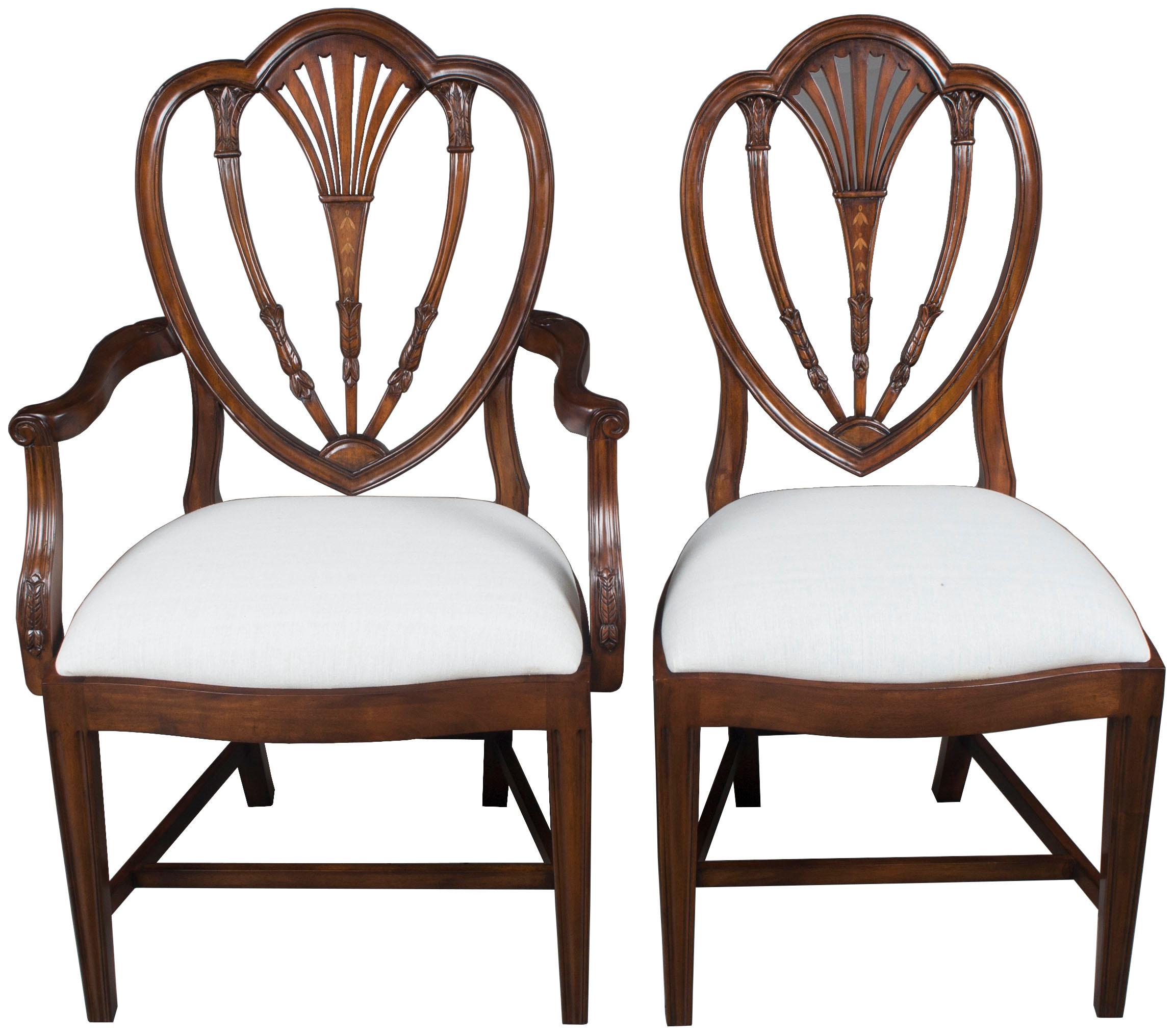 This lovely set of ten mahogany dining chairs consists of eight side chairs and two armchairs. The solid mahogany is lovely with a great color that will go well with any mahogany or even cherry table. Each chair is heavy and well built so they will