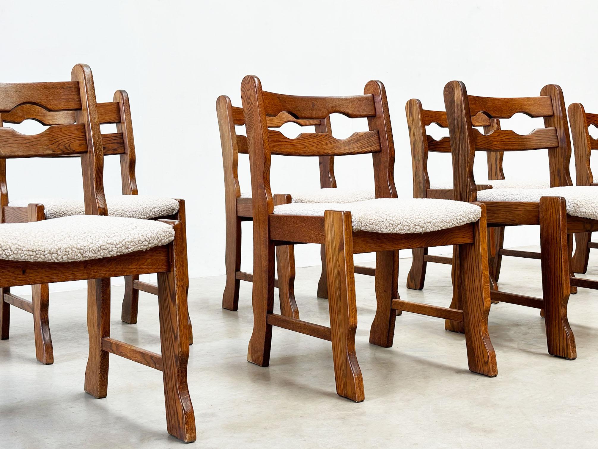 Bouclé Set of ten oak brutalist razorback and bouclé dining chairs