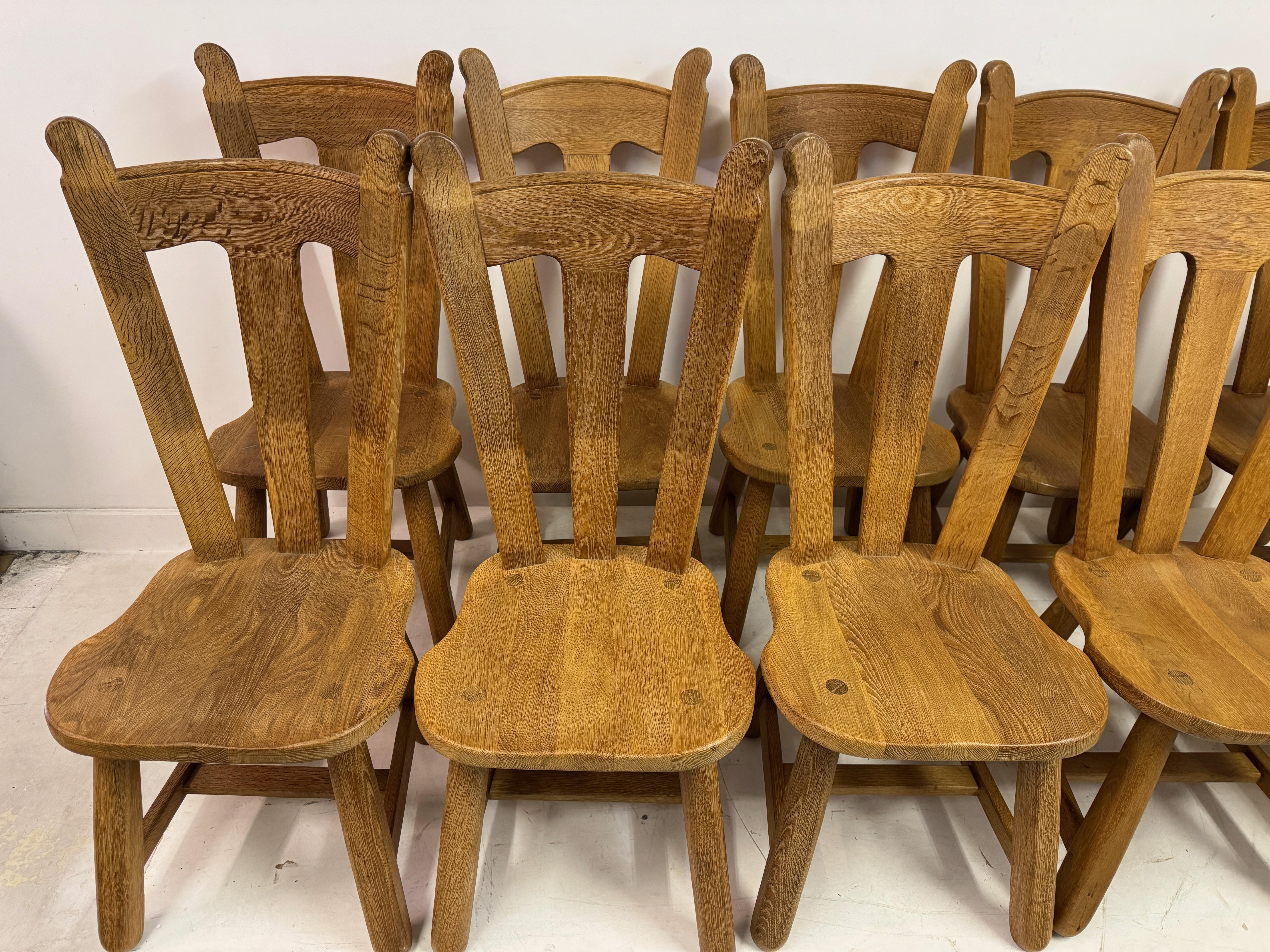 Belgian Set of Ten Oak Dining Chairs by De Puydt For Sale