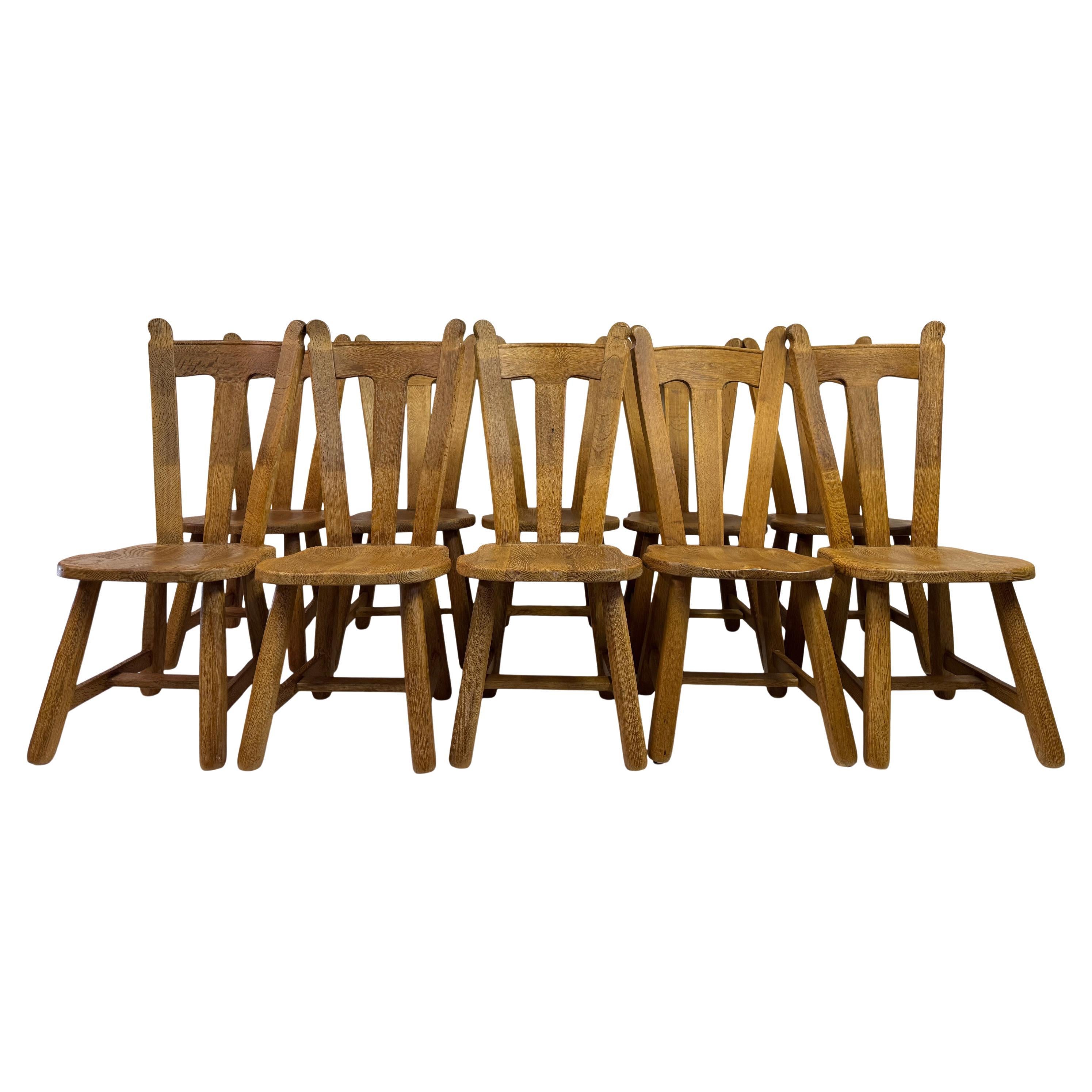 Set of Ten Oak Dining Chairs by De Puydt