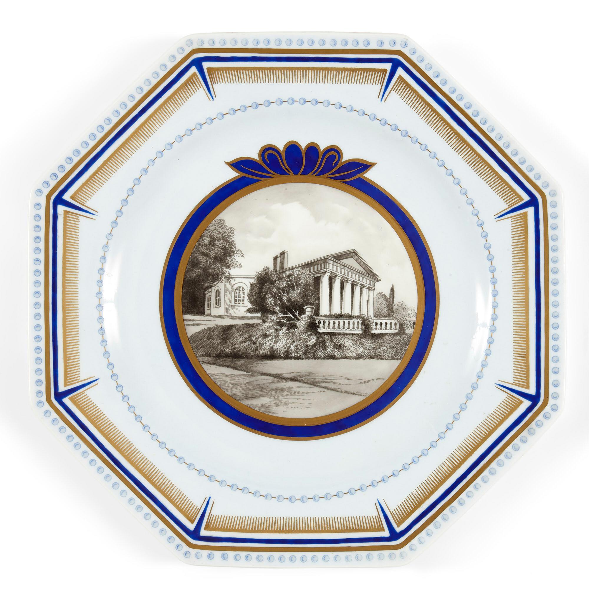 Set of ten octagonal porcelain plates of American interest by Wedgwood
English, 1927
Measures: Height 2cm, diameter 25.5cm.

The plates in this set, of octagonal form and of American interest, are fine examples of the Art Deco style. Each plate