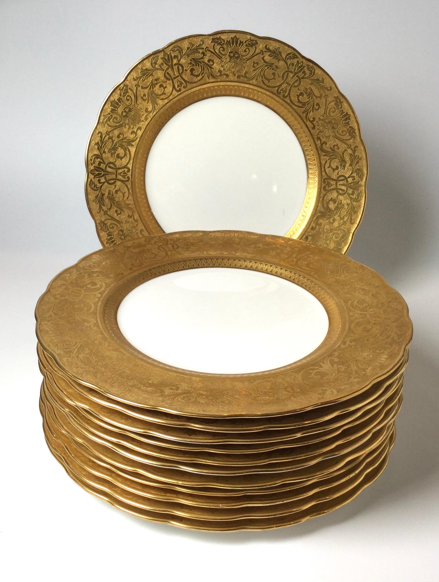 German Set of Ten Outstanding Gold Embossed Figural Head Service Plates