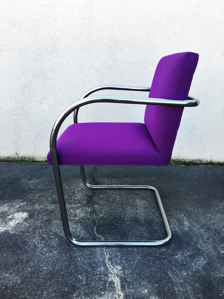 A great set of ten purple tubular Brno chairs by Mies van der Rohe for Knoll. Chrome is in great condition. Upholstery can be used as is or re-upholstered.