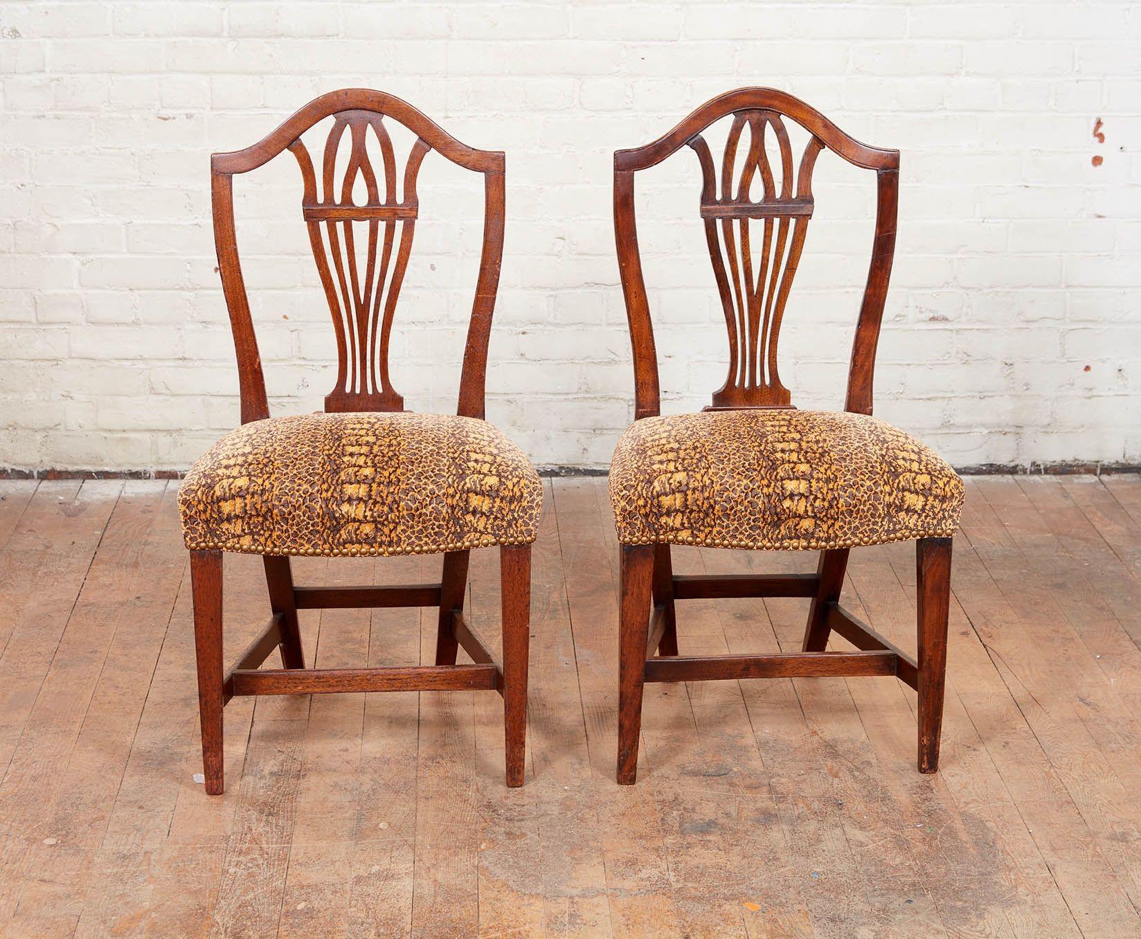 Good set of 10 George III period mahogany dining chairs, the arched crest over shaped and pierced back splat, the seats over upholstered and standing on square tapered legs joined by box stretchers, all with good nutty color. Several repairs and