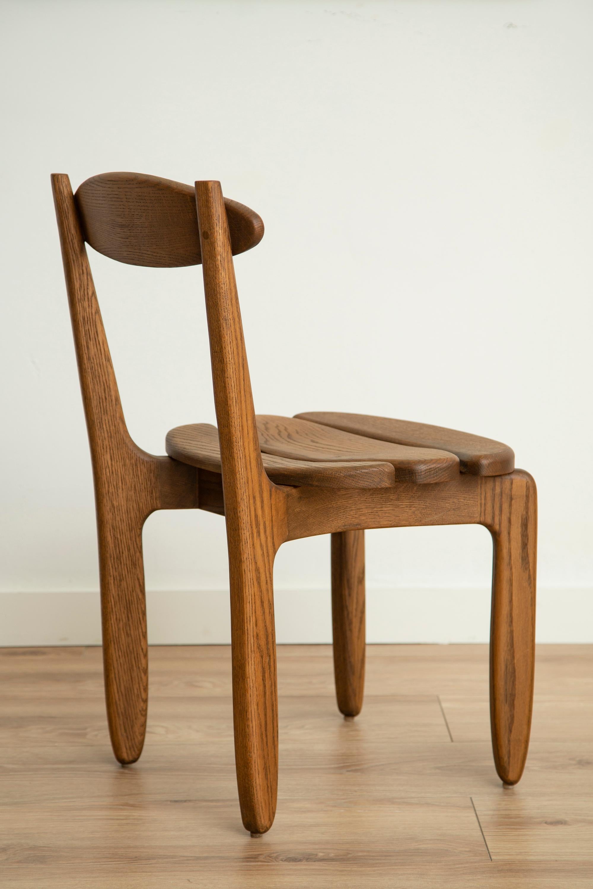 French Set of Ten Solid Oak Dining Room Chairs by Guillerme et Chambron