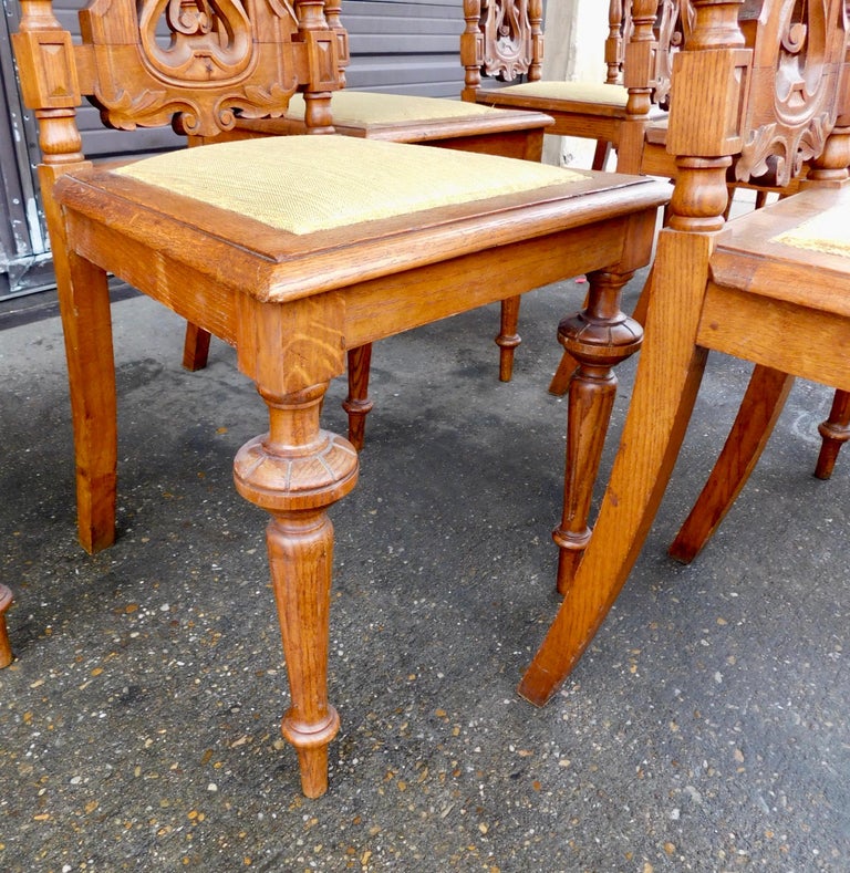 Set of Ten Spanish Revival Dining Chairs in Oak Circa 1920 For Sale at