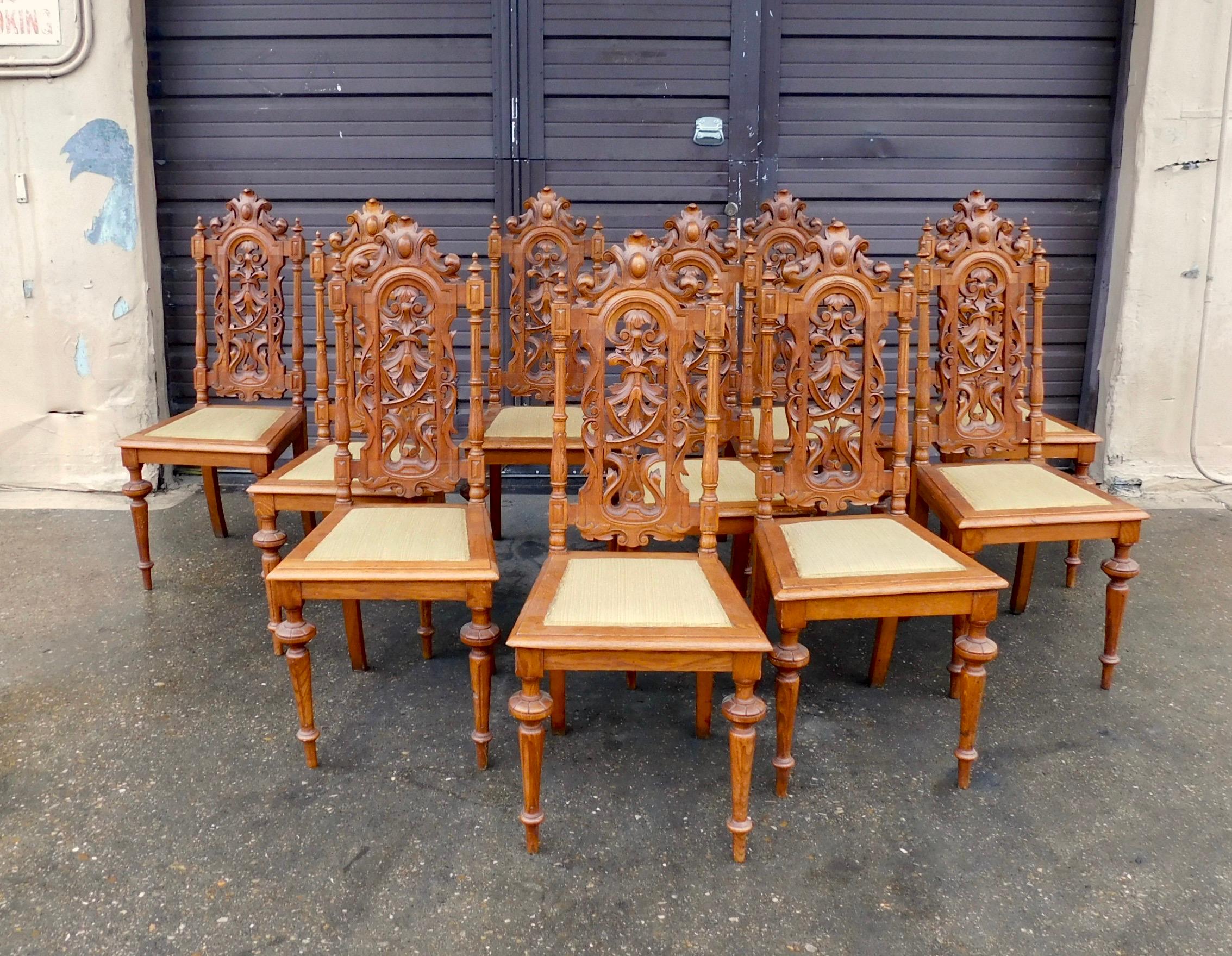 Set of ten Spanish Revival dining chairs in hand crafted oak. Made in Sweden in the 1920s. 
The entire set has just been lightly restored by our woodworkers. All wood joinery is in good condition as are seats and finish. With some signs of age