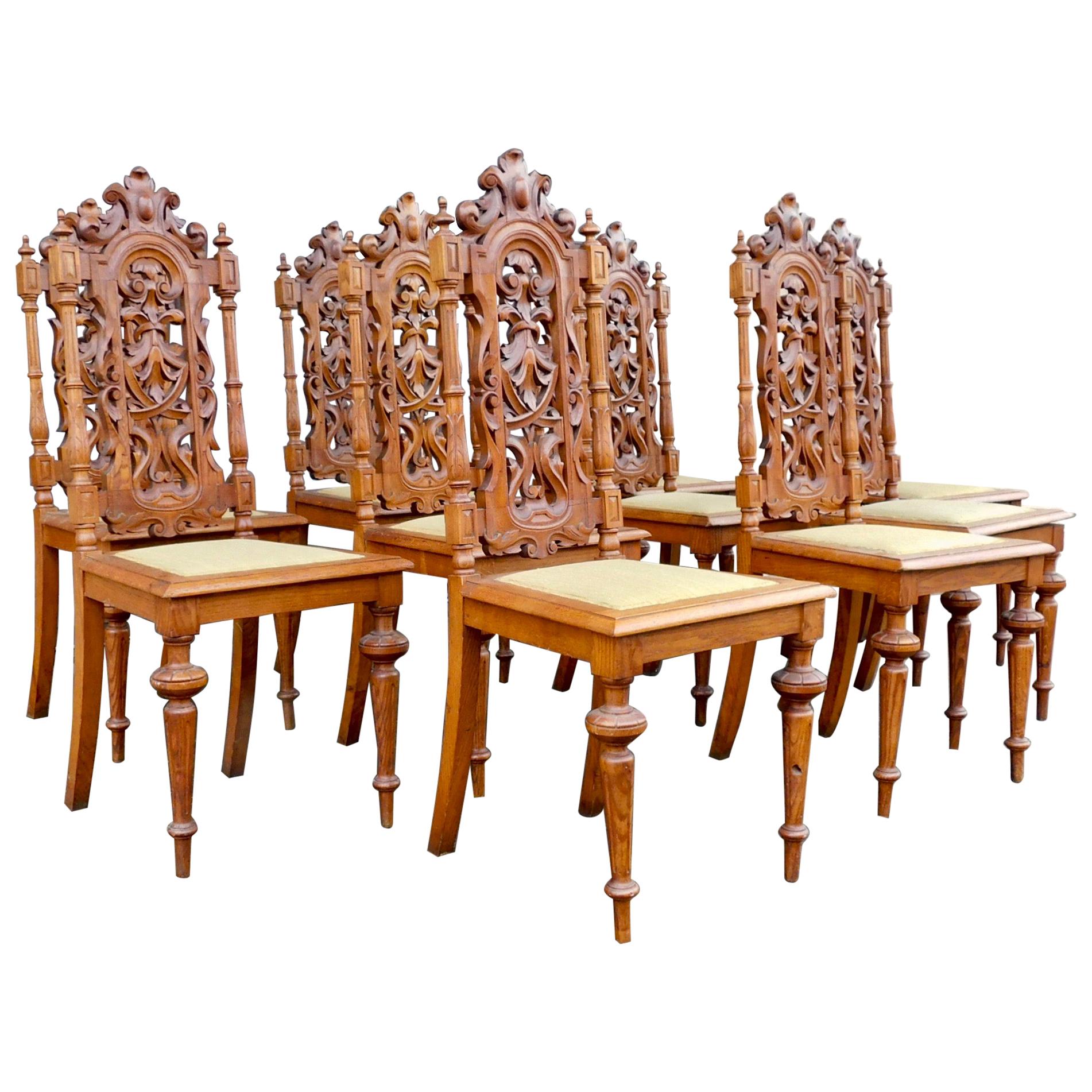 Set of Ten Spanish Revival Dining Chairs in Oak Circa 1920 For Sale