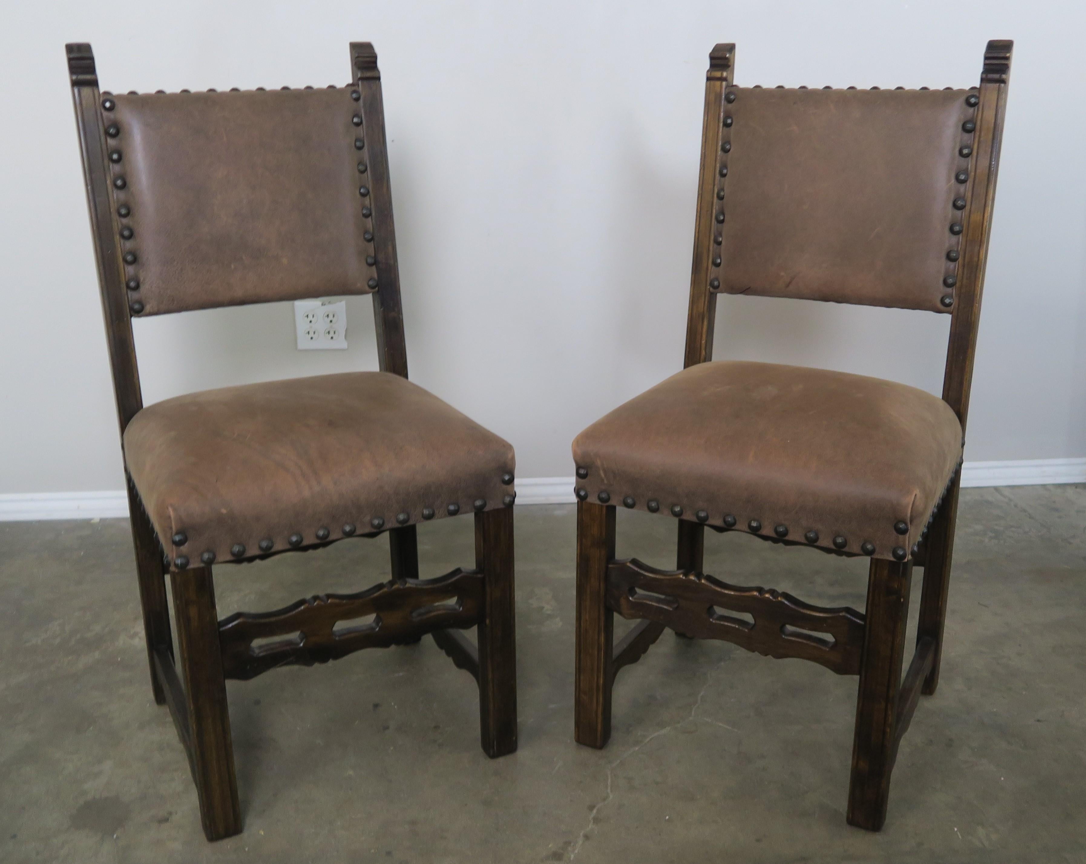 Set of Ten Spanish Style Leather Dining Chairs In Distressed Condition In Los Angeles, CA
