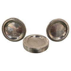Juego de diez posavasos de plata de ley, principios del siglo XX