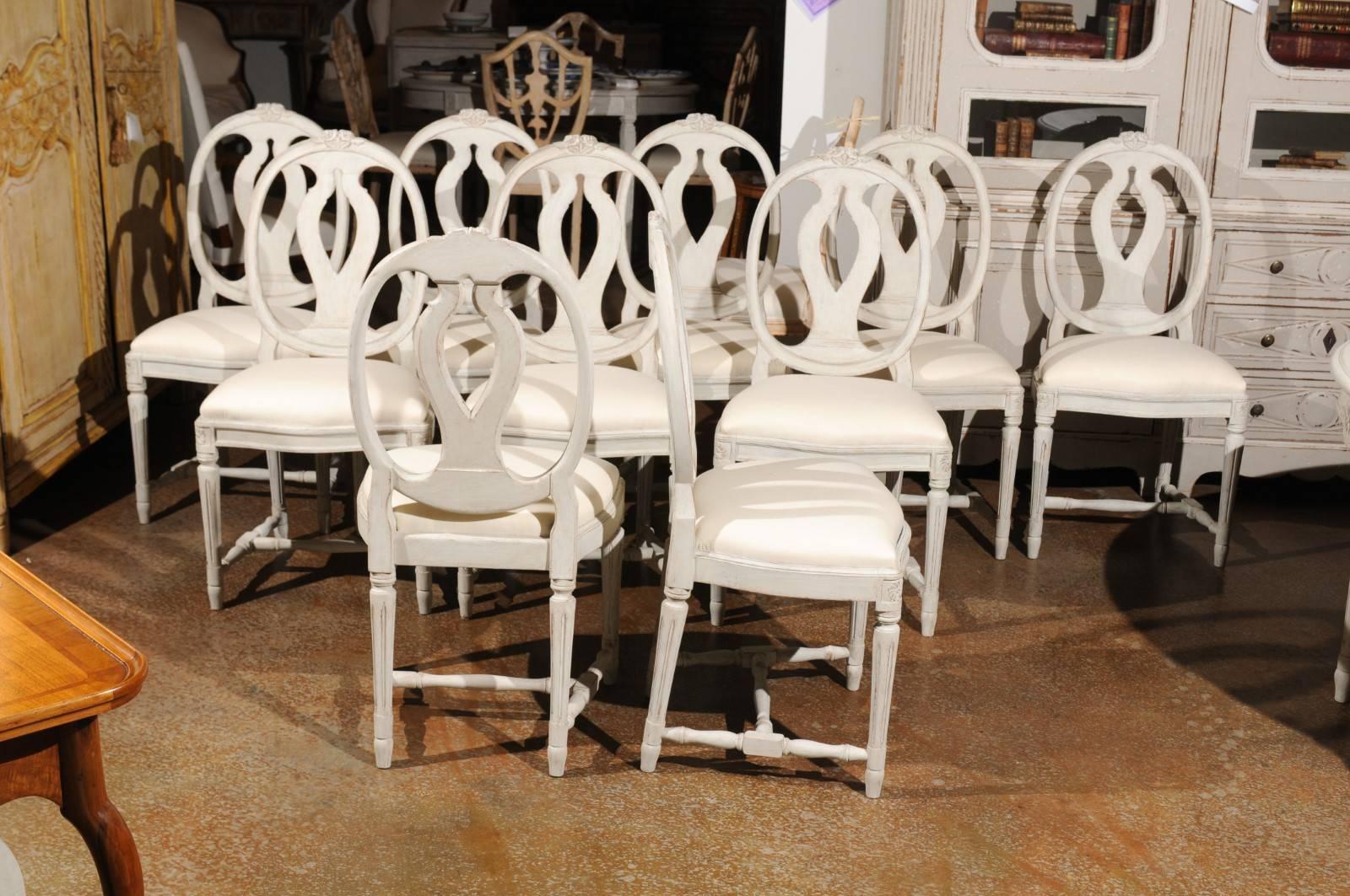 Carved Set of Ten Swedish Gustavian Style Dining Chairs with Oval Backs, circa 1900
