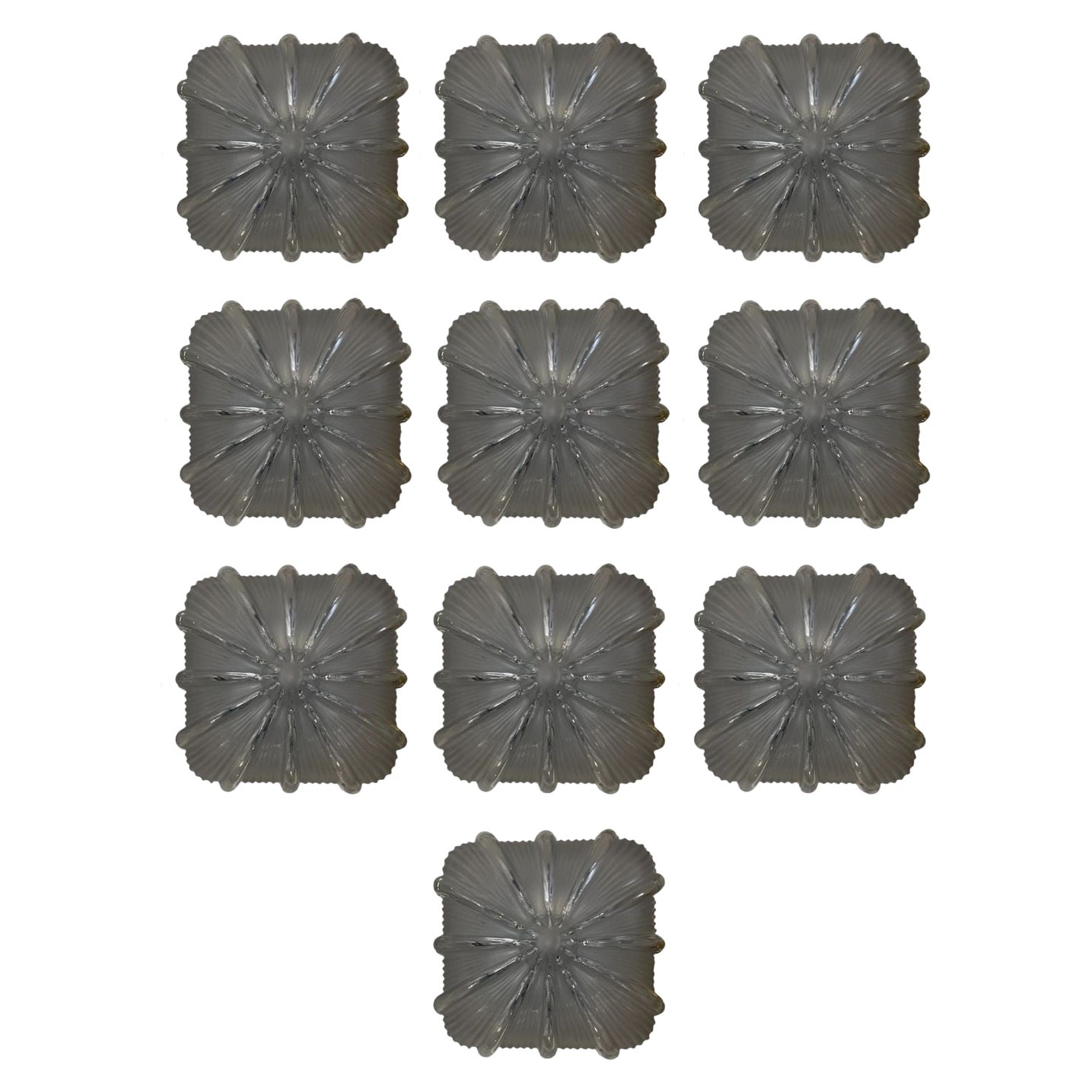 Juego de diez empotrables / apliques de cristal de Murano texturizado. Italia, años sesenta.