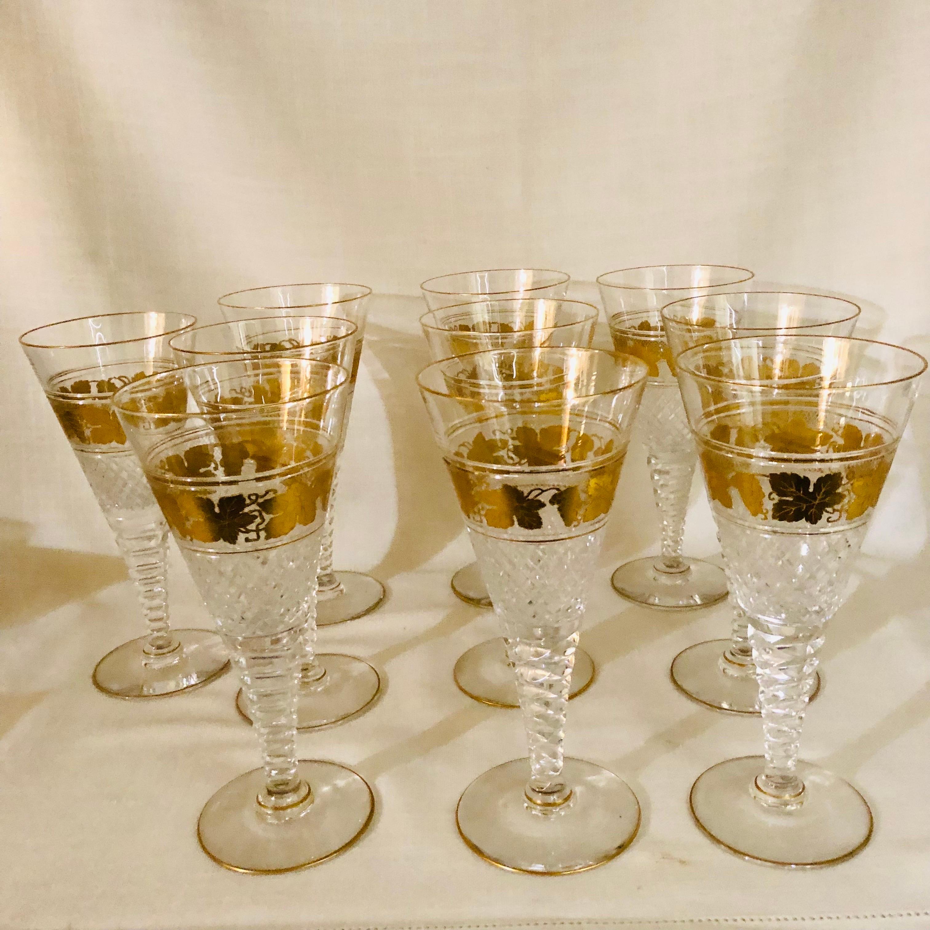 This is a gorgeous set of ten Val St. Lambert Belgium cut crystal goblets decorated with gilded grape leaves and grapes. The bases or stems of the goblets are beautifully cut as you can see in the pictures and the video. Each goblet is 10.25 inches