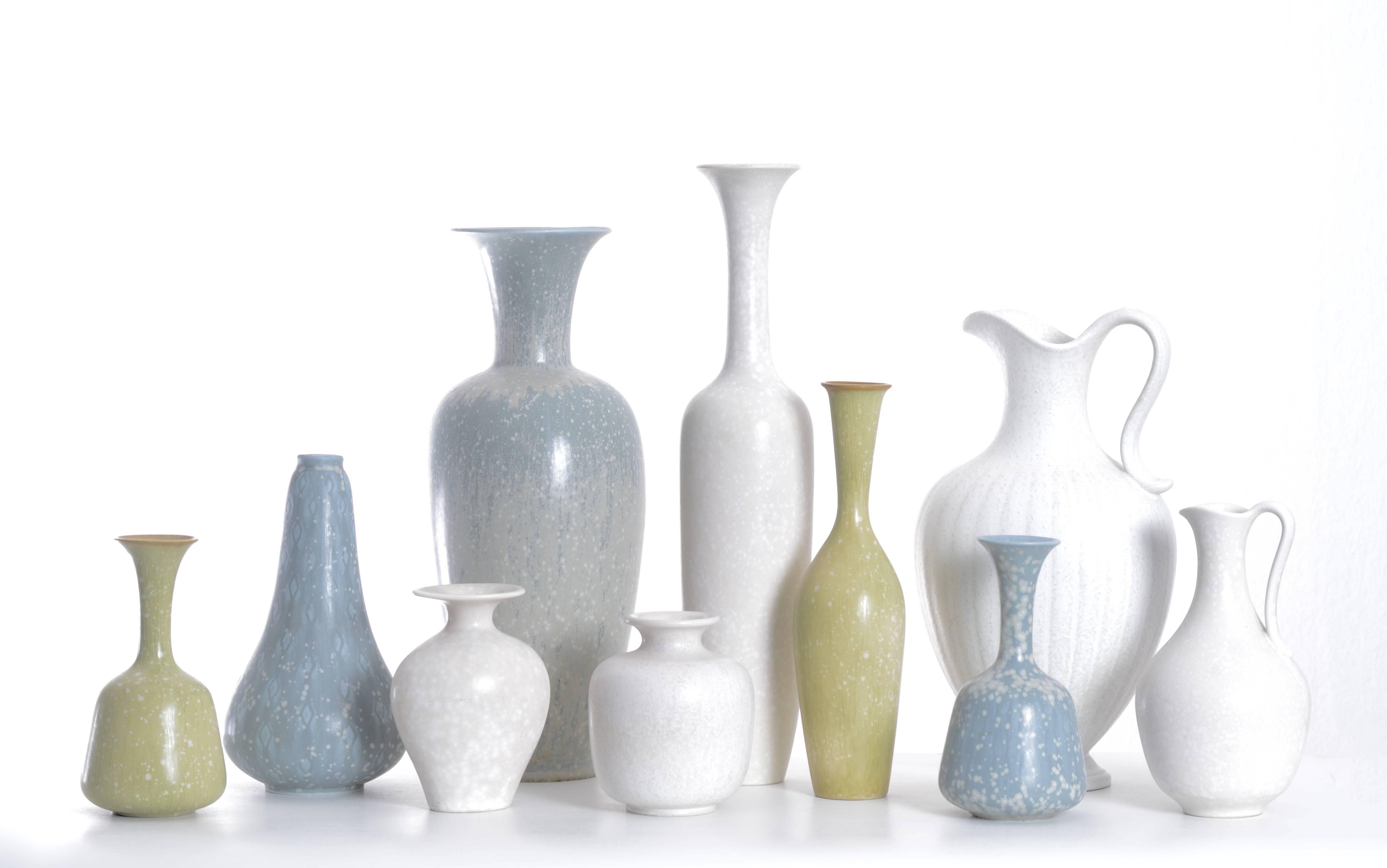 Set of ten stoneware vases in beautiful pastel colors by Gunnar Nylund for Rörstrand, Sweden. Measure: Height 11-36cm.

Condition: Excellent condition with small signs of age.