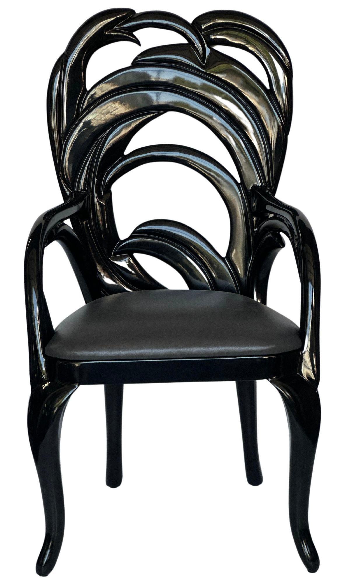 Set of ten vintage carved with fine wood, each lacquered with a glossy black tone and with a black leather upholstered cushion. The use of black lacquer not only adds a touch of sophistication but also provides a sleek, glossy finish that
