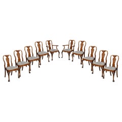 Set of ten walnut George II style dining chairs