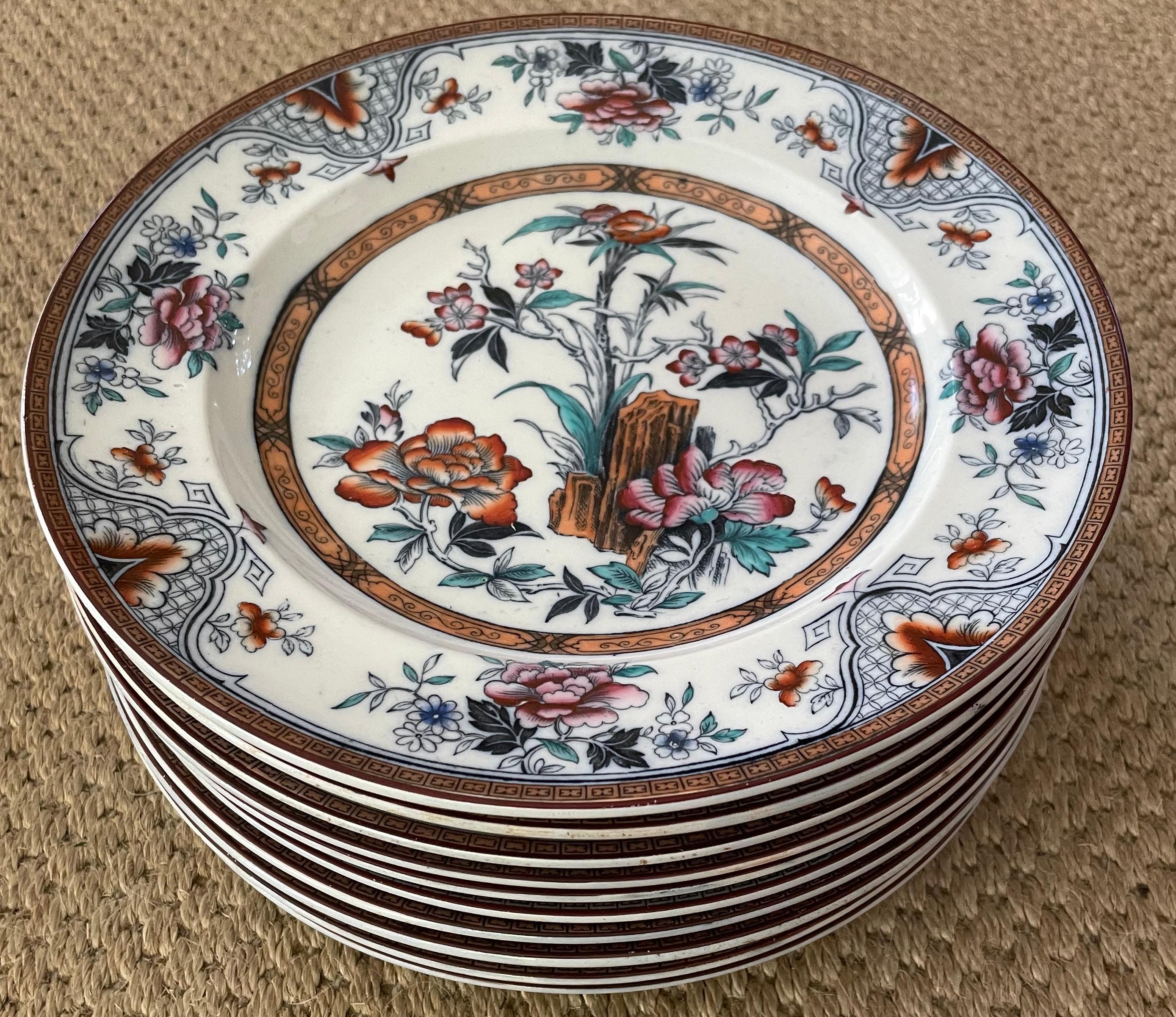 Set of ten Wedgwood chinoiserie plates. Ten Wedgwood chinoiserie floral plates in red, green and blue hues on white ground.  Impressed 