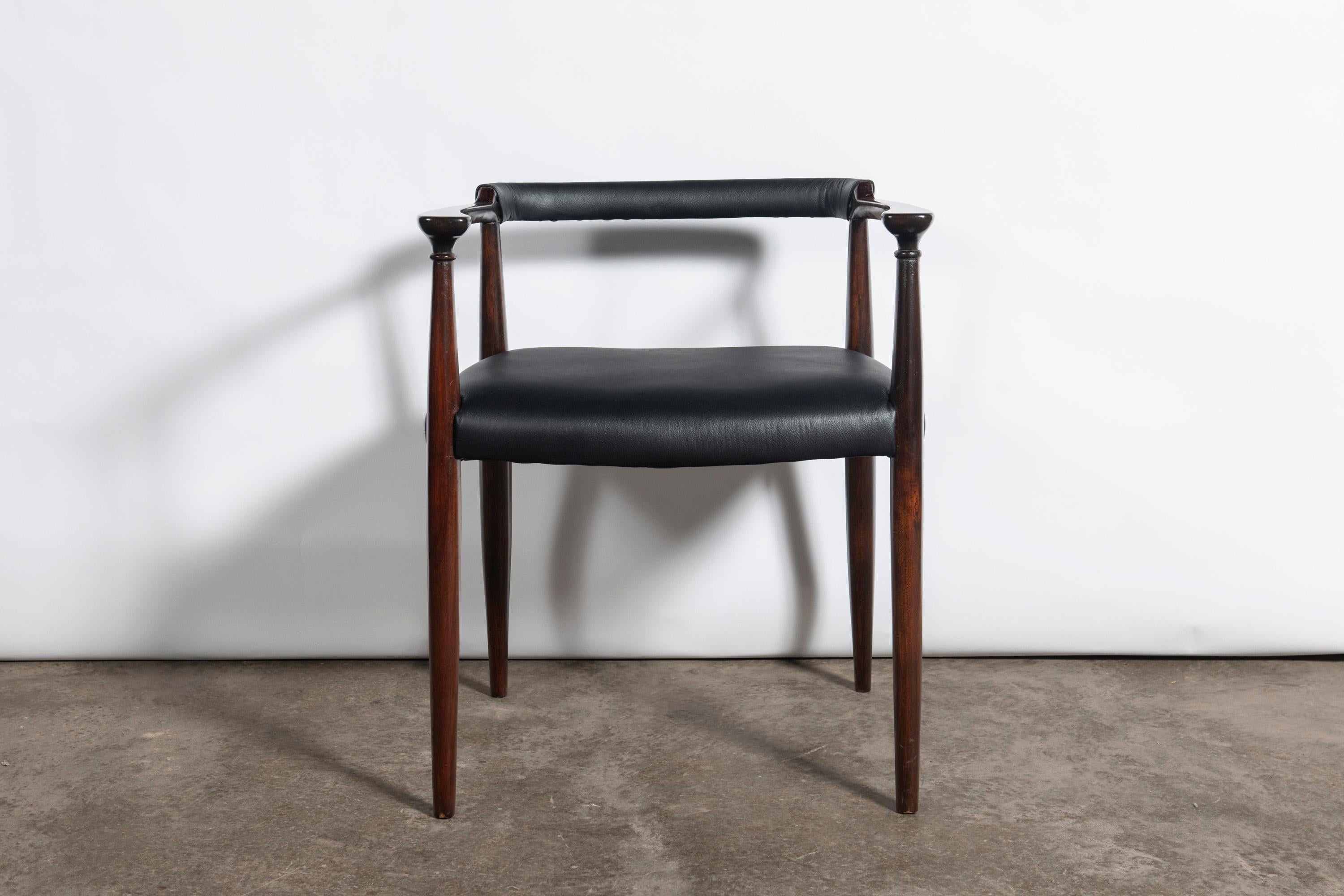 Set of ten wood and leather dining chairs designed by Alberto Churba, Argentina, circa 1970.