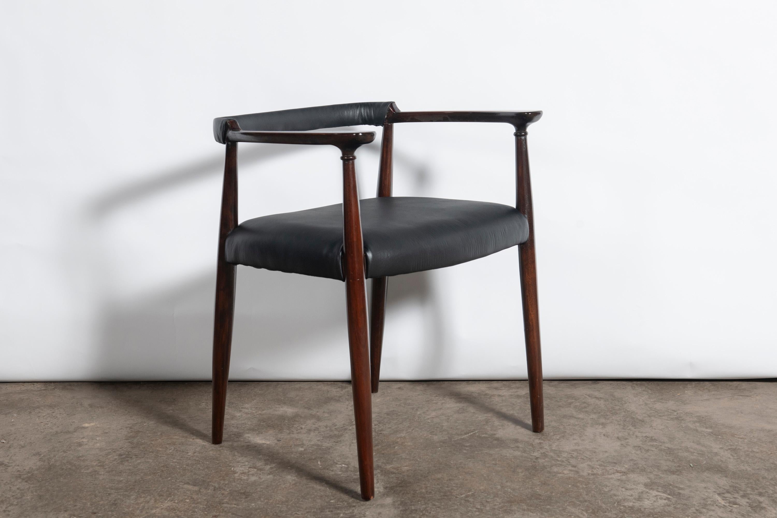 Mid-Century Modern Set of ten wood and leather dining chairs designed by Alberto Churba, c. 1970. For Sale