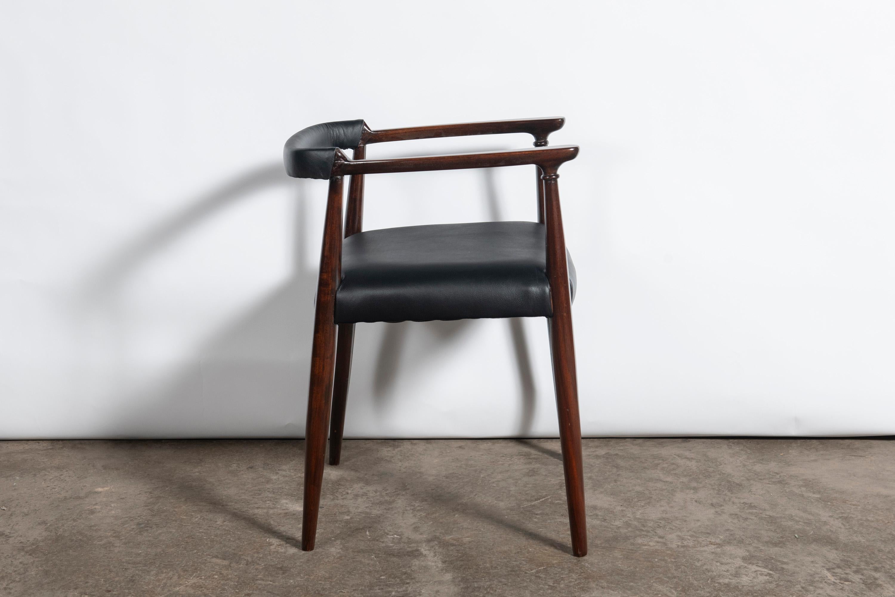Argentine Set of ten wood and leather dining chairs designed by Alberto Churba, c. 1970. For Sale