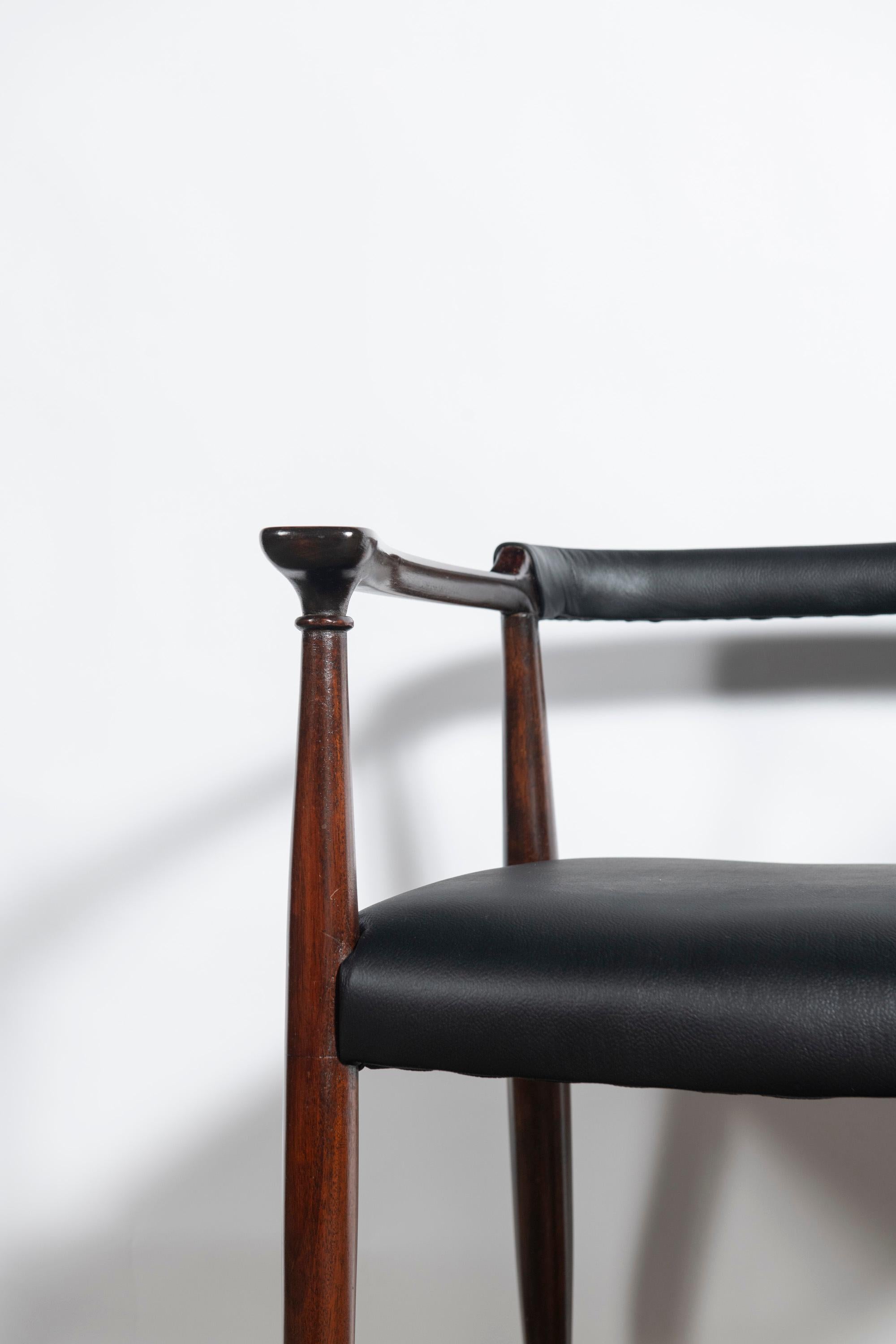 Leather Set of ten wood and leather dining chairs designed by Alberto Churba, c. 1970. For Sale