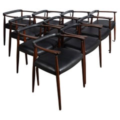Conjunto de diez sillas de comedor de madera y cuero diseñadas por Alberto Churba, c. 1970.