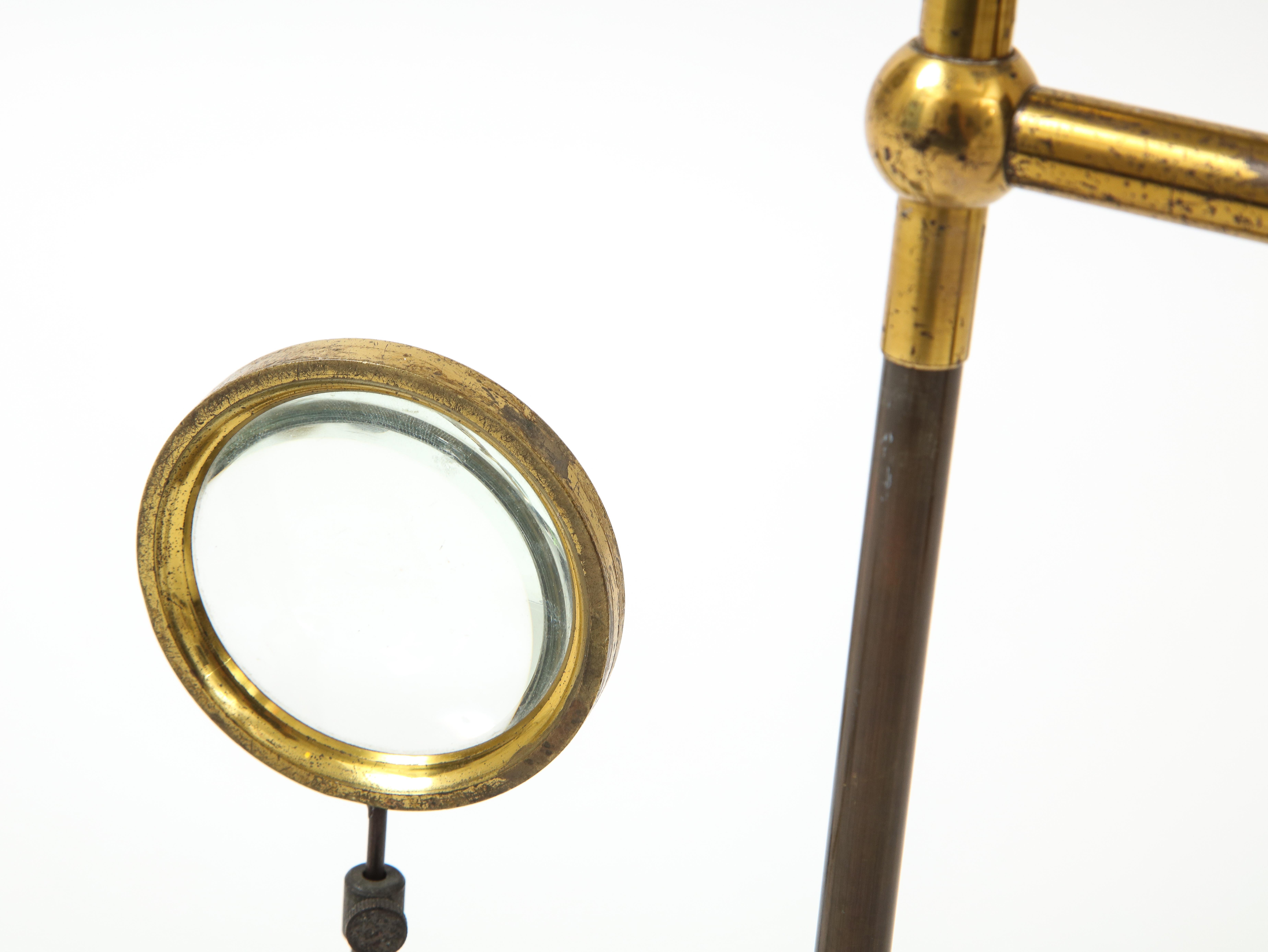 Set of Thee Brass Magnifying Glasses on Stands, early 20th C. 3