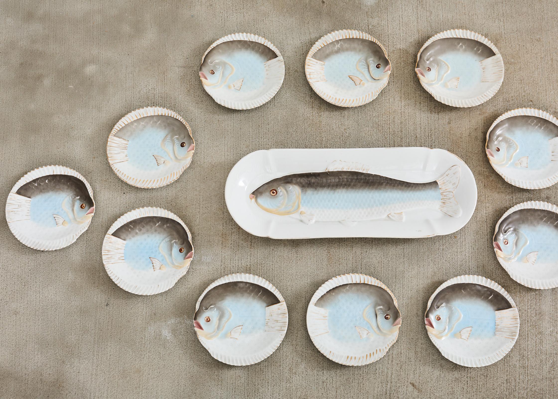 Juego de trece platos de pescado de porcelana checa de Bohemia Schwalb Victoriano