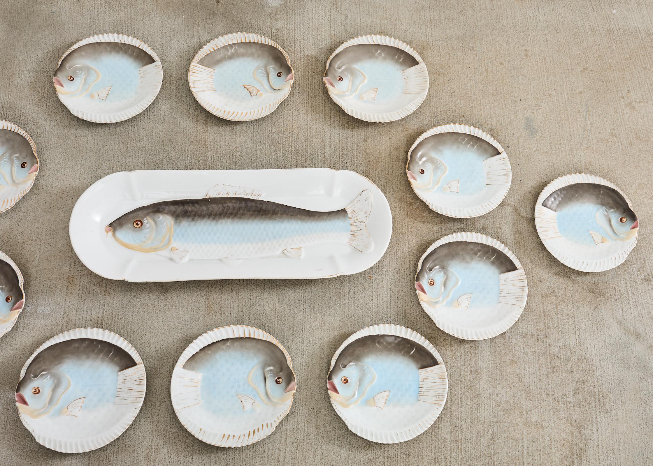 Juego de trece platos de pescado de porcelana checa de Bohemia Schwalb Checo