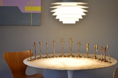 Set of Thirteen Scandinavian Art Deco Solid Bass & Copper Candleholders