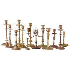 Set of thirteen Scandinavian Art Deco Solid Bass & Copper Candleholders