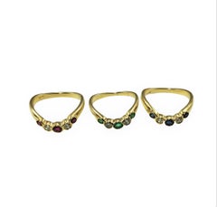 Set of Three 14 Karat Yellow Gold Ruby/Emerald/Sapphire and Diamond Rings
