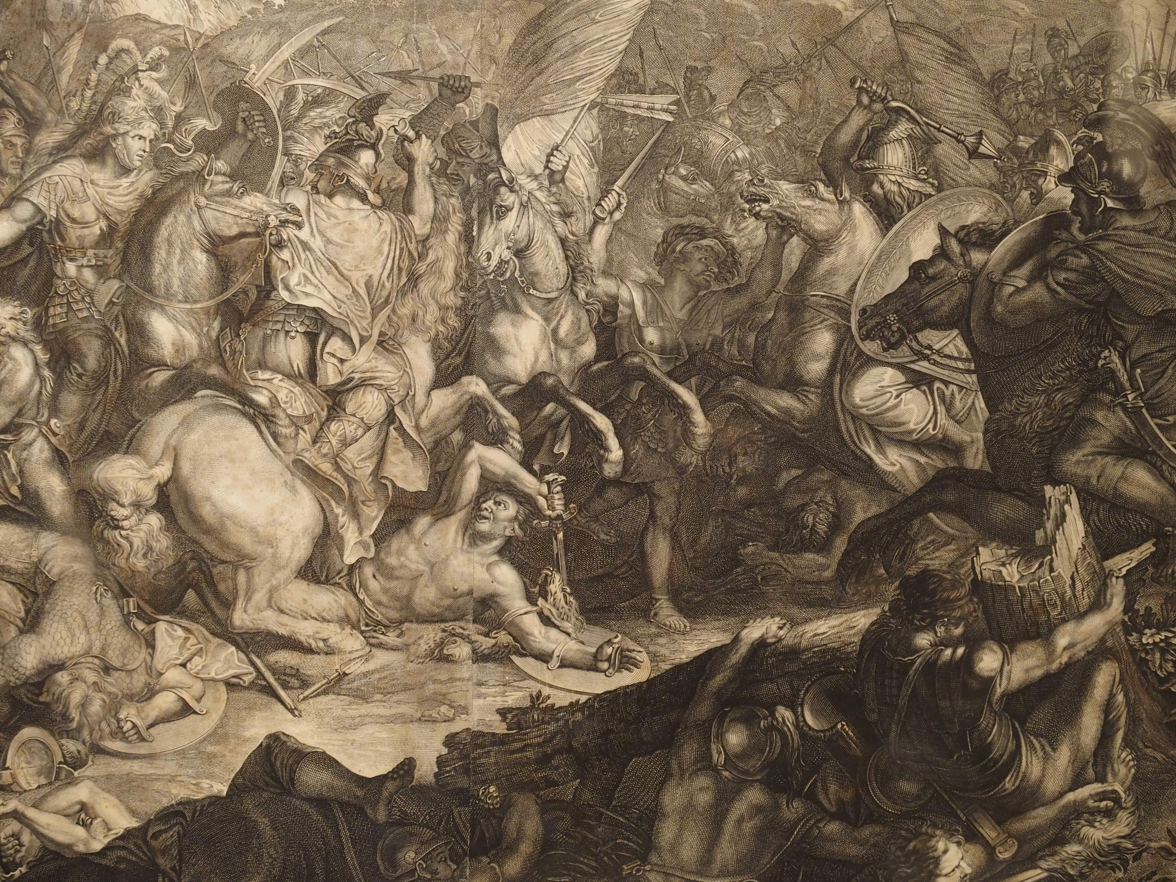 This incredibly detailed set of antique engravings date to circa 1700. The three framed scenes with glass covers depict the Battles of Alexander the Great. They are based on the monumental original paintings by Charles Le Brun, arguably the greatest