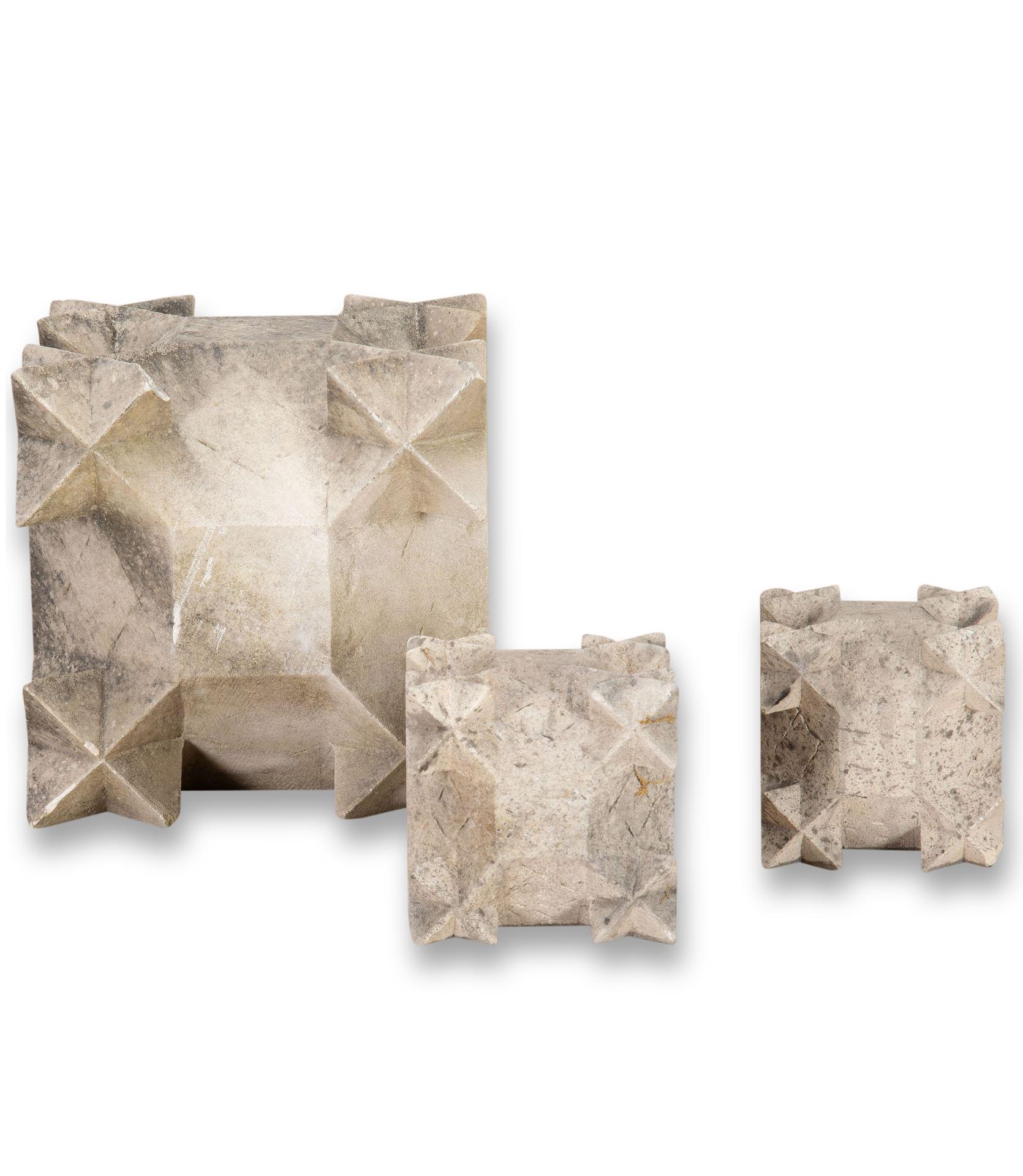 A wonderful rare set of three 18th Cetury French carved 'Pierres de Sorcieres'.

Hand carved polyhedra placed on rooftops and terraces in the 17th Century as protective talismans against witches. Superstition had it that the jagged edges would
