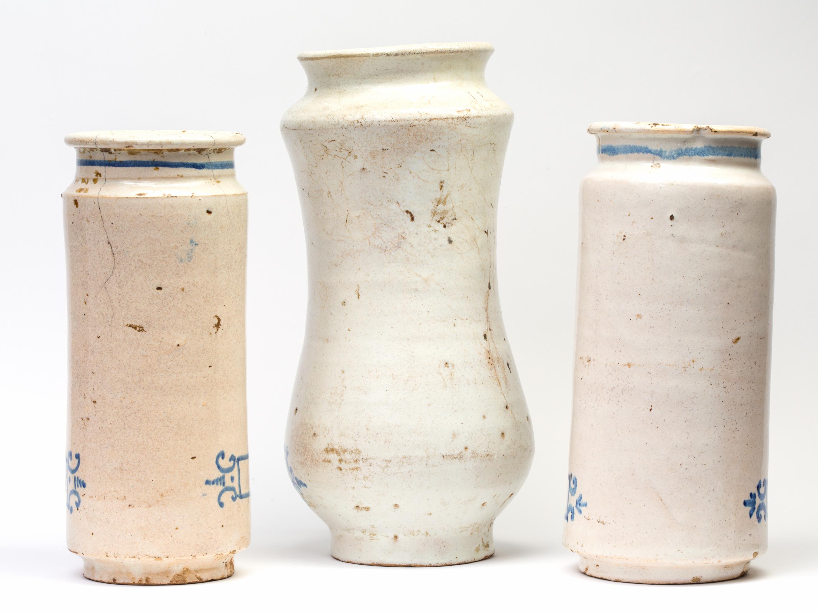 A set of three (3) 18th century glazed ceramic apothecary jars made in Talavera de la Reina, Spain - known for its ceramic tradition since the Roman times. Also called 