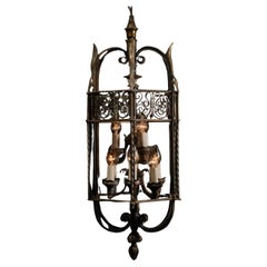 Ensemble de trois lustres gothiques en bronze de 1910