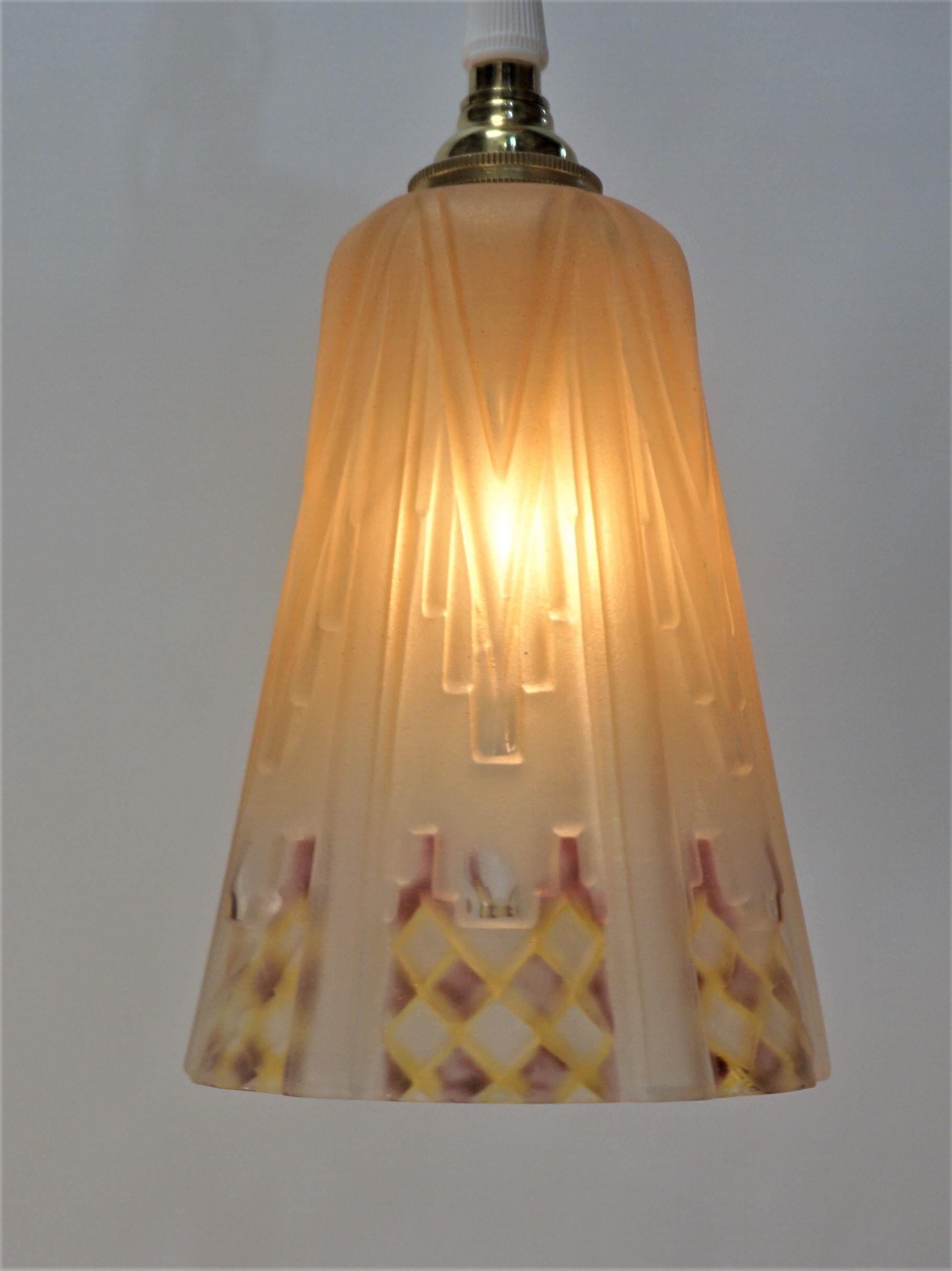 Set of thee French 1920's Art Deco painted clear frost glass shades have been modified with new brass canopy as pendant lights.
Measures: Glass is 4