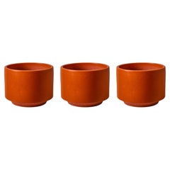 Set of Three 1960s Gainey Orange Glazed Planters