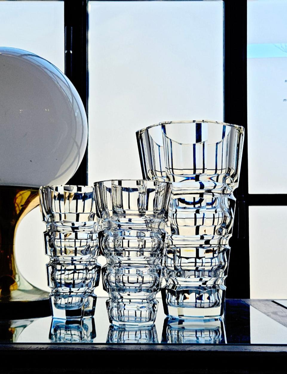 A handsome set of Italian crystal vases each with exceptional weight. We found this set in Rome with some signs of wear so have had them restored here in Florence by our glass experts. Each vase is exceptionally heavy.

Dimensions: Large Vase H30cm