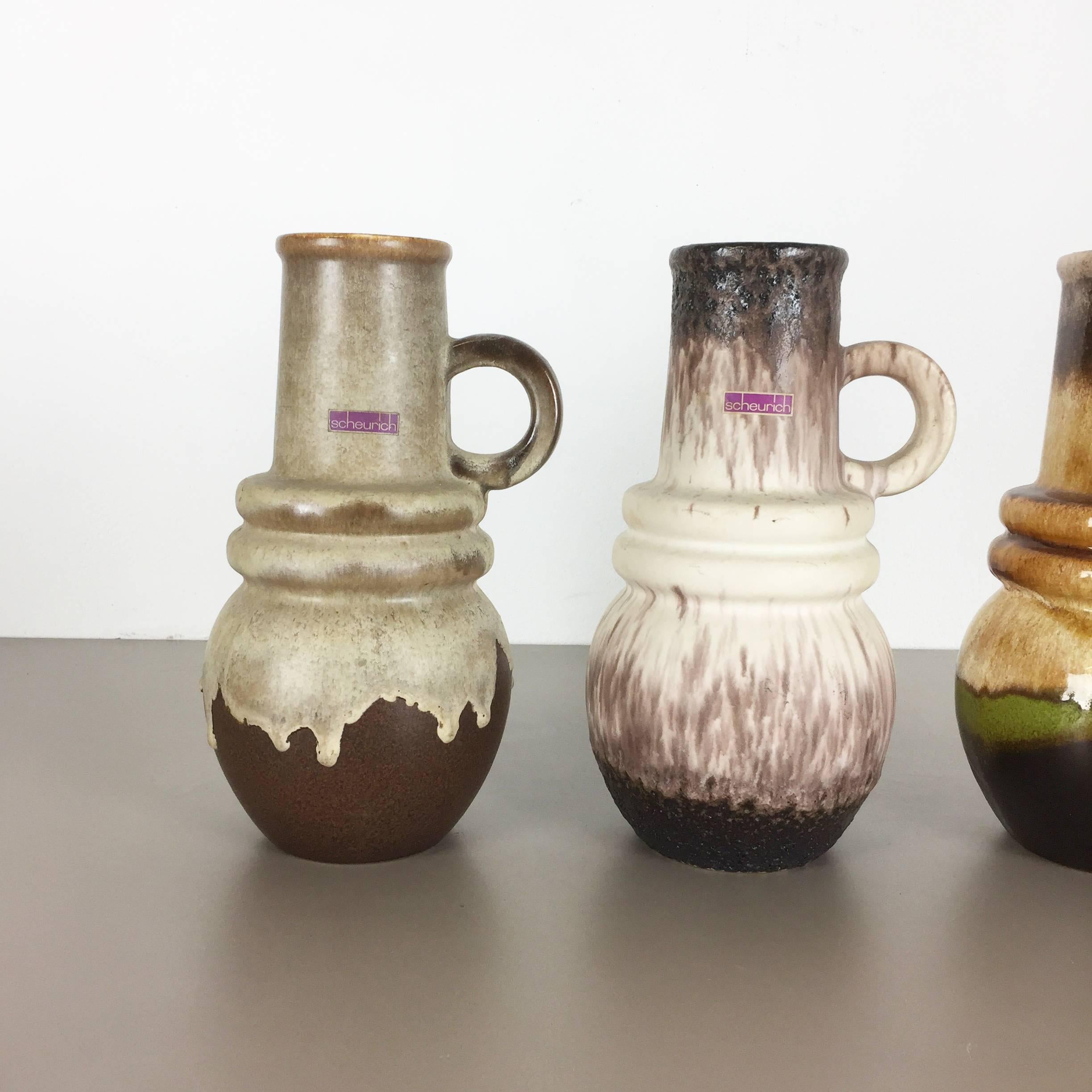 Article:

Set of three fat lava art vases

Model: Vienna
428 26

Producer:

Scheurich, Germany



Decade:

1970s


These original vintage vases was produced in the 1970s in Germany. It is made of ceramic pottery in fat lava optic.