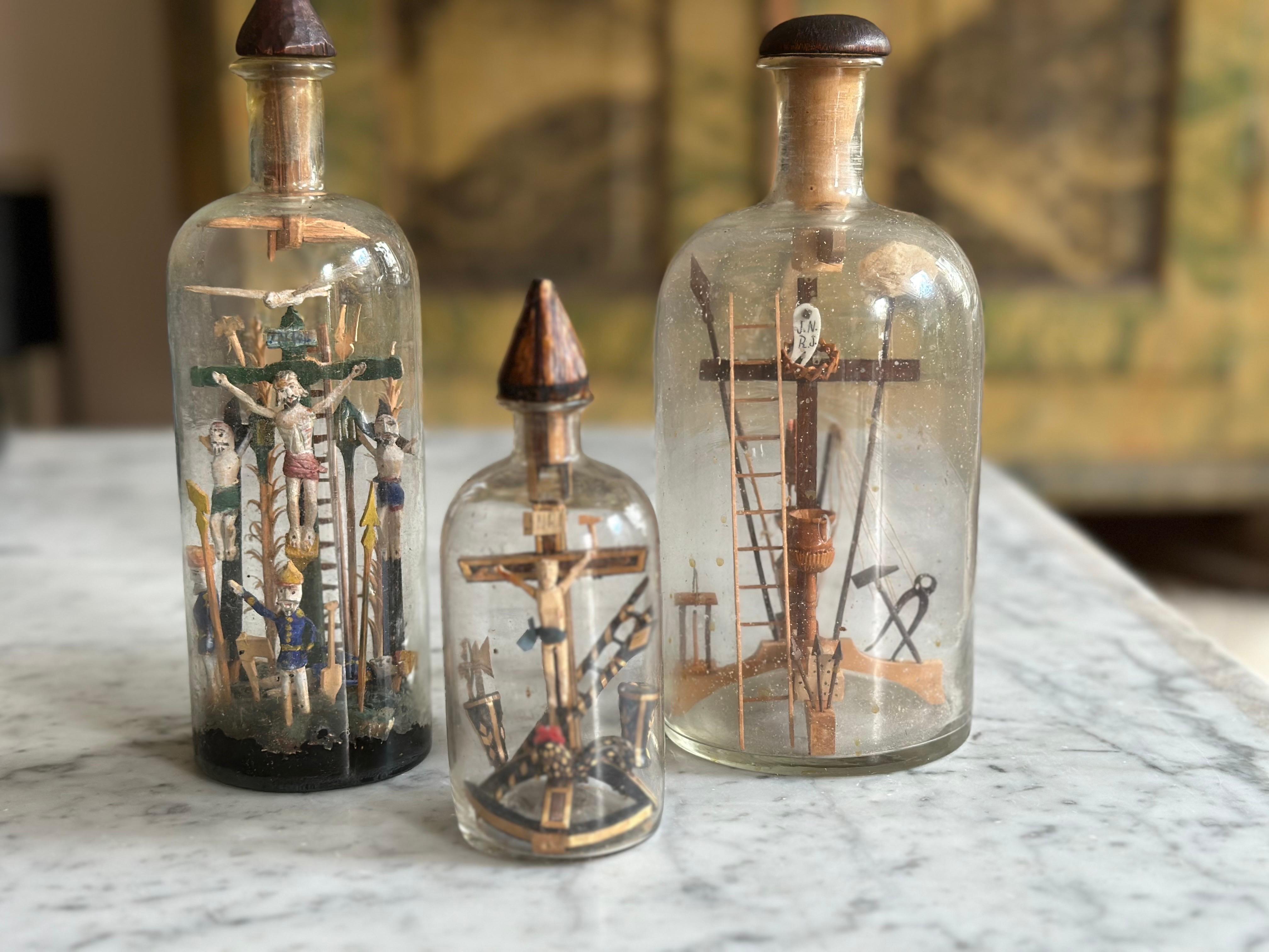 Set of Three 19th-Century Alpine Patience Bottles with Crucifixion Scene 1