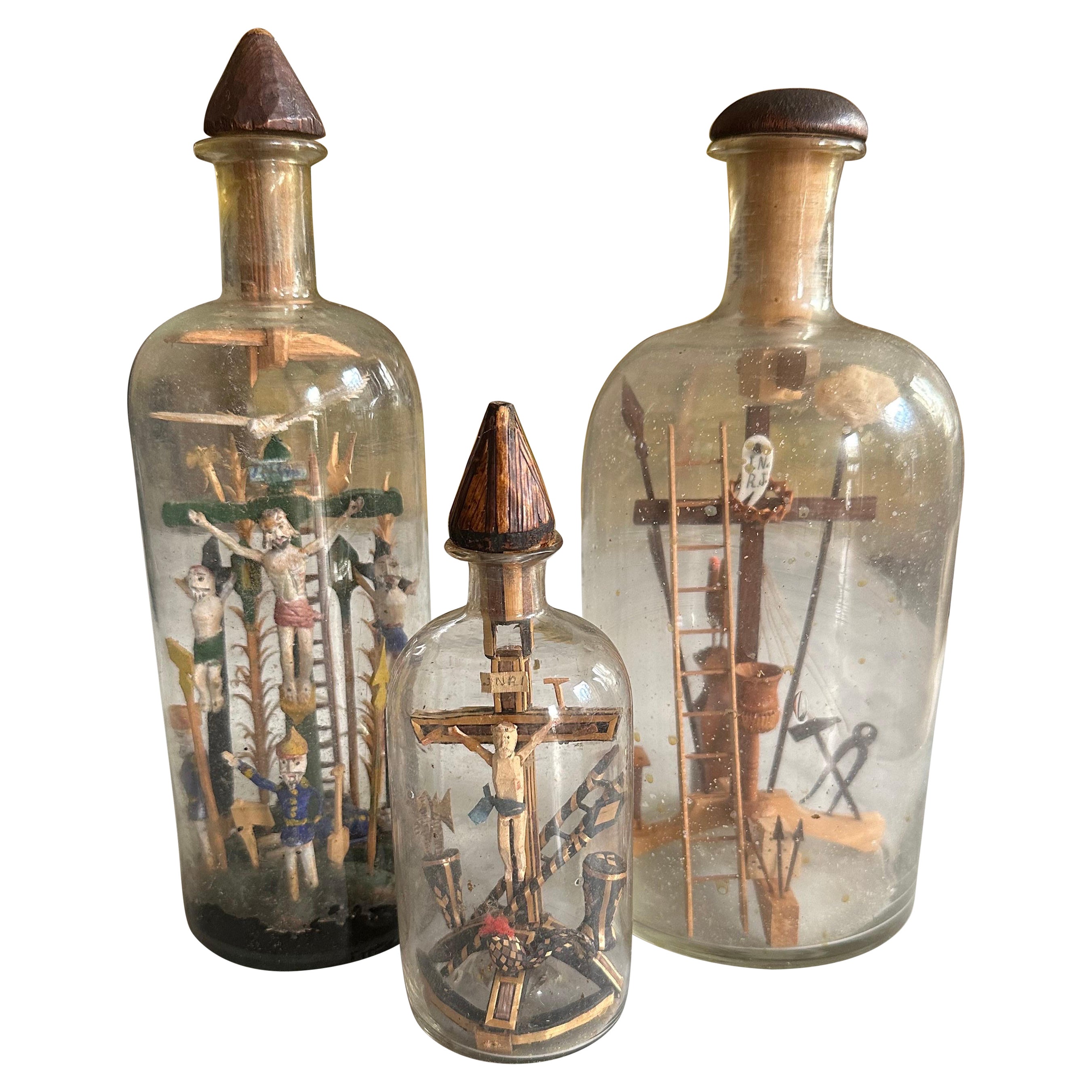 Set of Three 19th-Century Alpine Patience Bottles with Crucifixion Scene