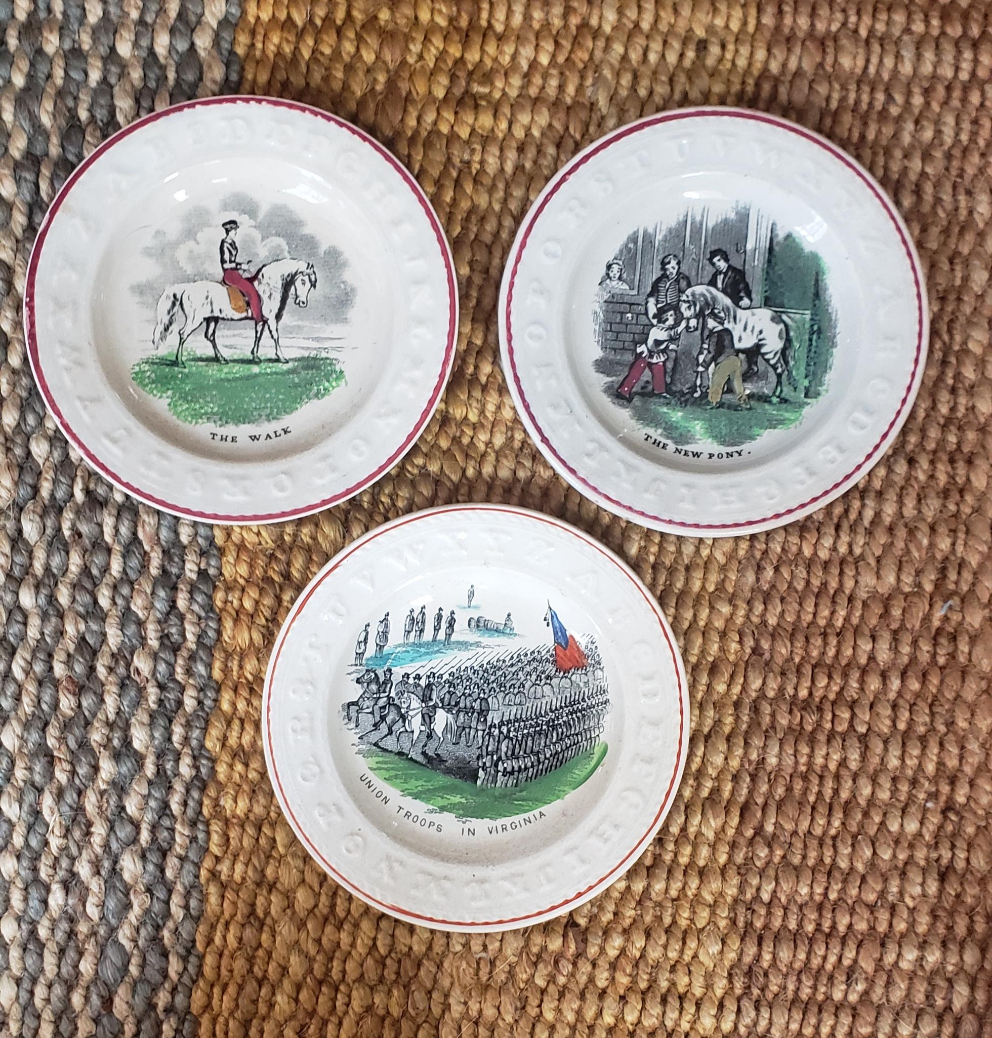 This is a glorious set of three child transferware alphabet or ABC plates dating from the early to mid-19th century. The plates measures just 5-1/8 inches in diameter with the letters of the alphabet press moulded around the rim and surrounded by a