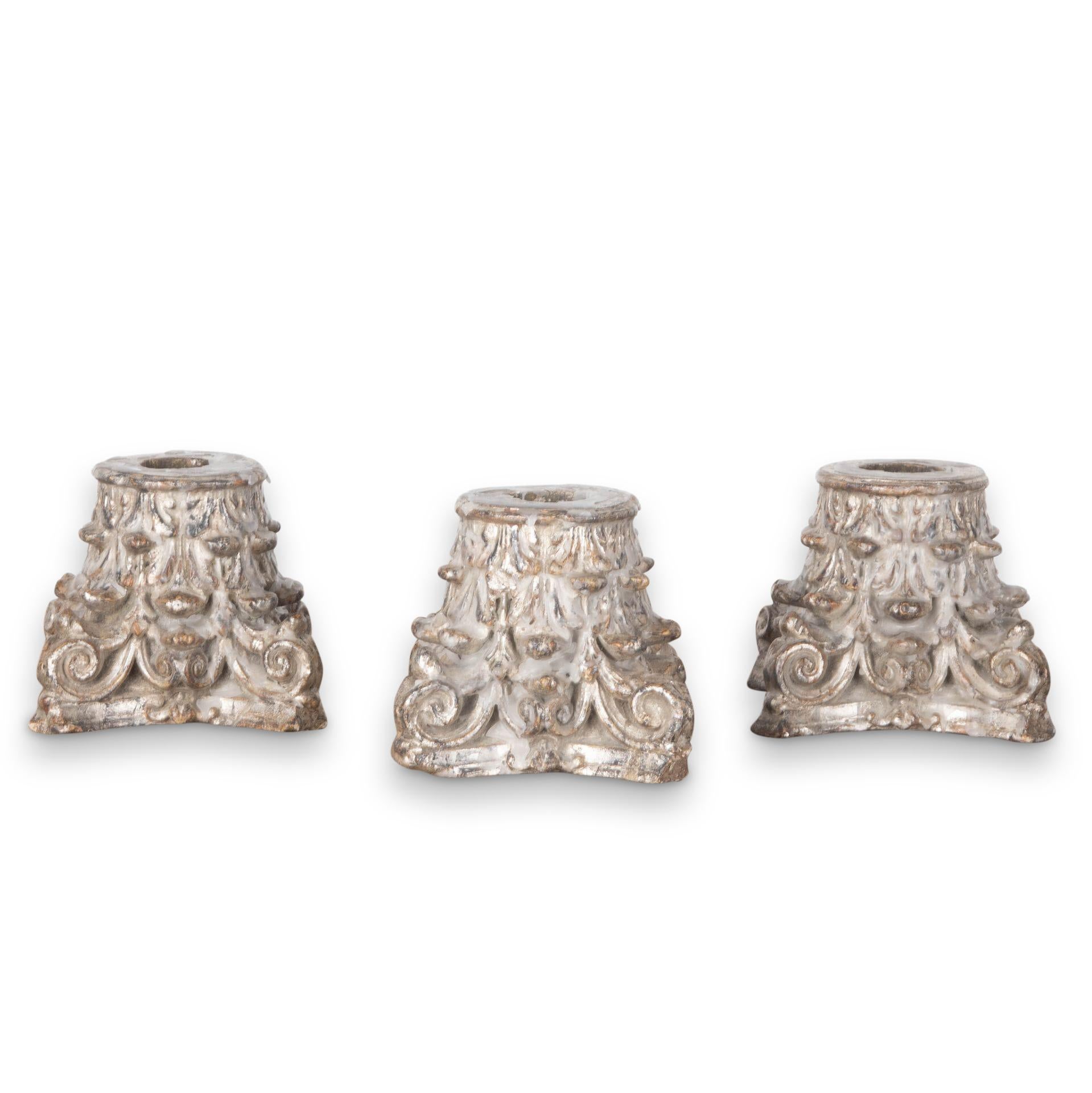 Stylish set of three 19th Century silver gilt Corinthian column bases with baluster candles. 
Remnants of old wax dripping present to all creating a wonderful patina.